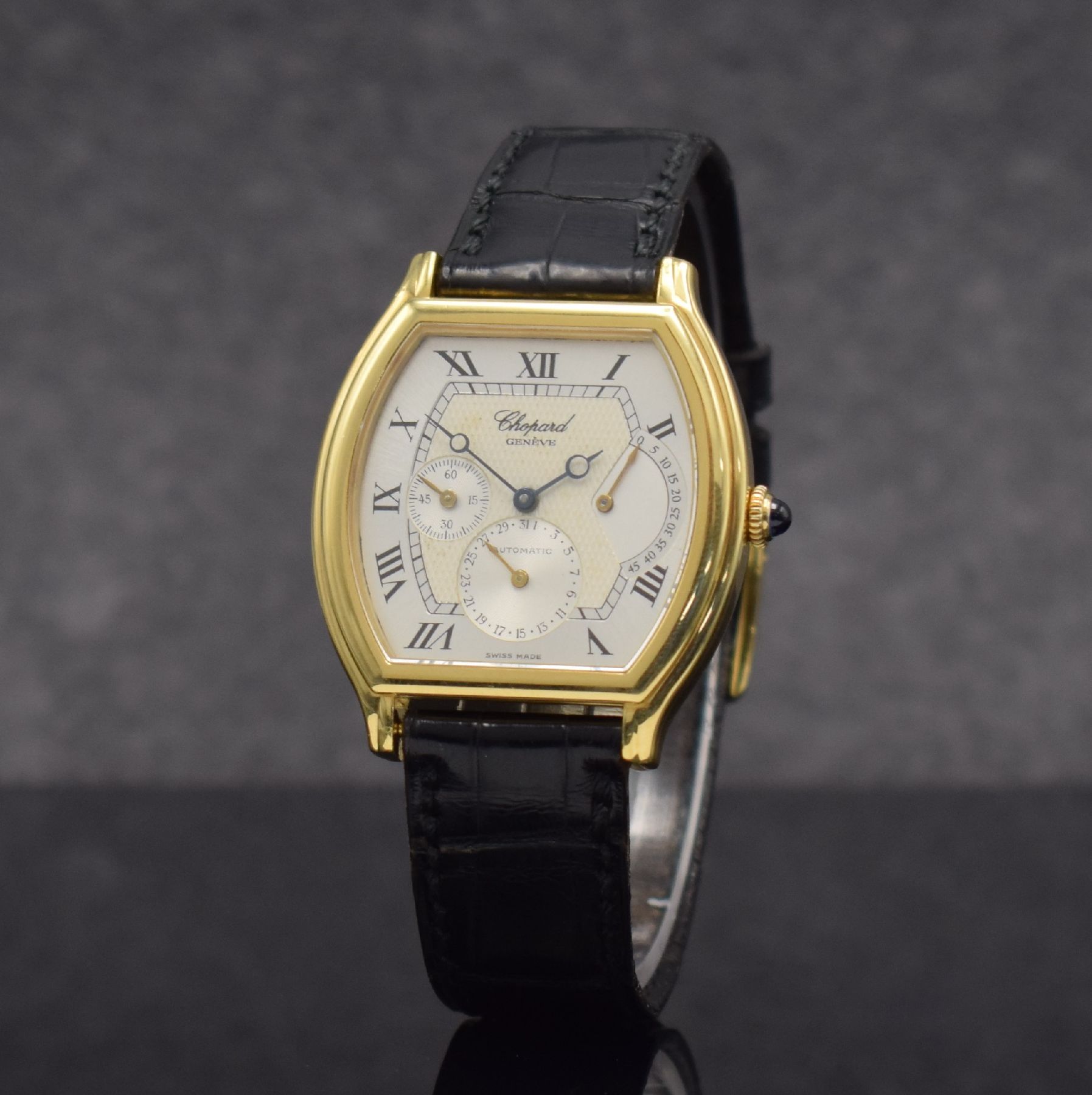 Detail b: CHOPARD Tonneau Power Reserve Herrenarmbanduhr in GG 750/000, Schweiz um 1998, Handaufzug,Ref. 2248, 2-teil. Geh., Boden 8-fach verschr., Lederband ...