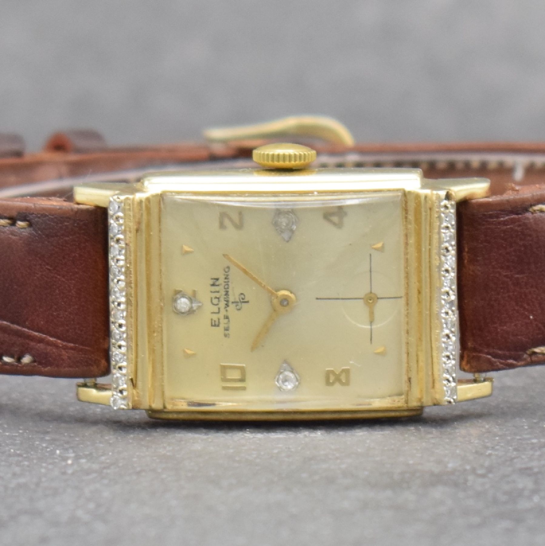 Detail a: LORD ELGIN Herrenarmbanduhr in GG 585/000, USA 1940er Jahre, Handaufzug, Boden aufgedr., nachtr. m. 3 Diamantindizes bes. Zifferbl. m. Fehldruck ...