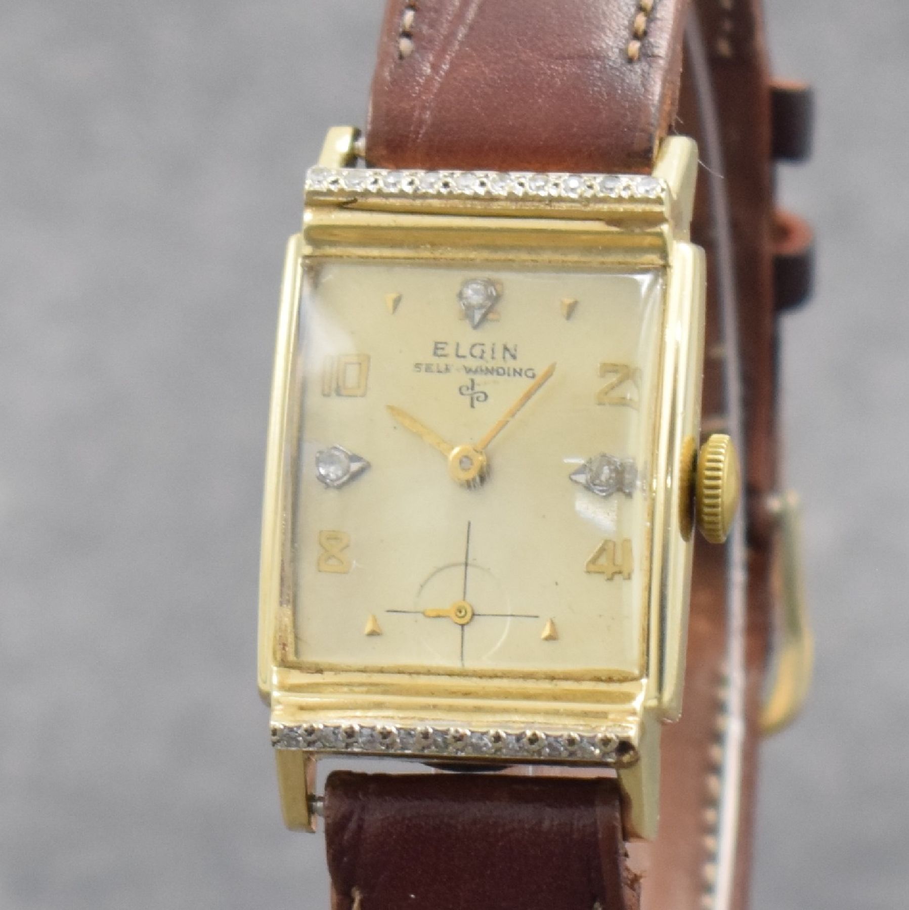 Detail c: LORD ELGIN Herrenarmbanduhr in GG 585/000, USA 1940er Jahre, Handaufzug, Boden aufgedr., nachtr. m. 3 Diamantindizes bes. Zifferbl. m. Fehldruck ...