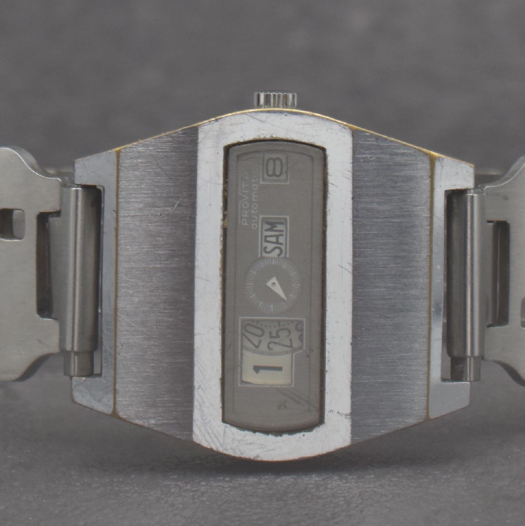 Detail a: PROVITA Herrenarmbanduhr mit digitaler Anzeige, Schweiz um 1970, Automatik, verchr. Geh., Stahlboden aufgedr., neutr. Stahlband später, digit. ...