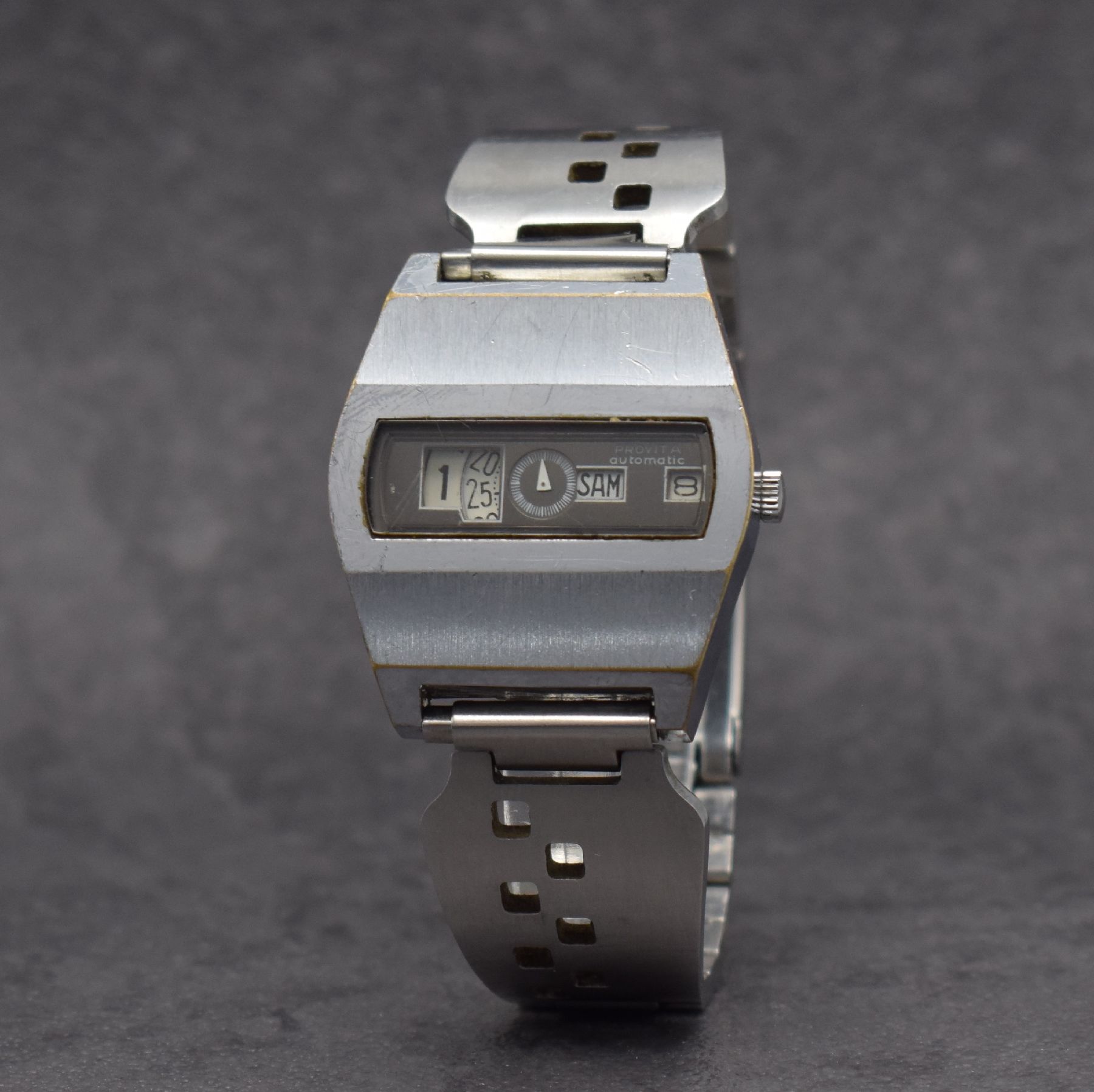 Detail b: PROVITA Herrenarmbanduhr mit digitaler Anzeige, Schweiz um 1970, Automatik, verchr. Geh., Stahlboden aufgedr., neutr. Stahlband später, digit. ...