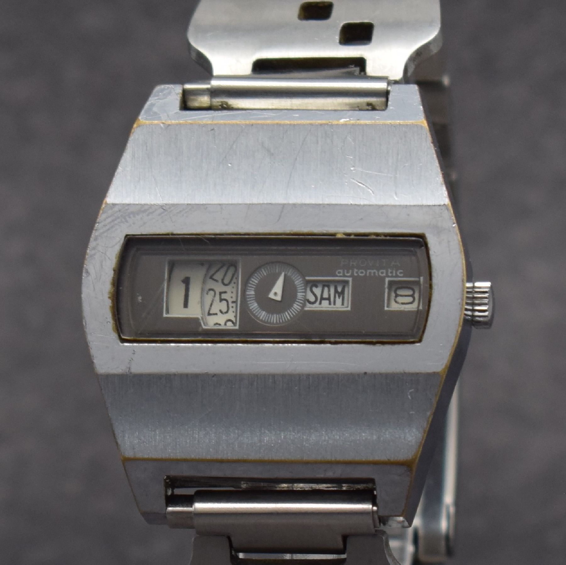 Detail c: PROVITA Herrenarmbanduhr mit digitaler Anzeige, Schweiz um 1970, Automatik, verchr. Geh., Stahlboden aufgedr., neutr. Stahlband später, digit. ...