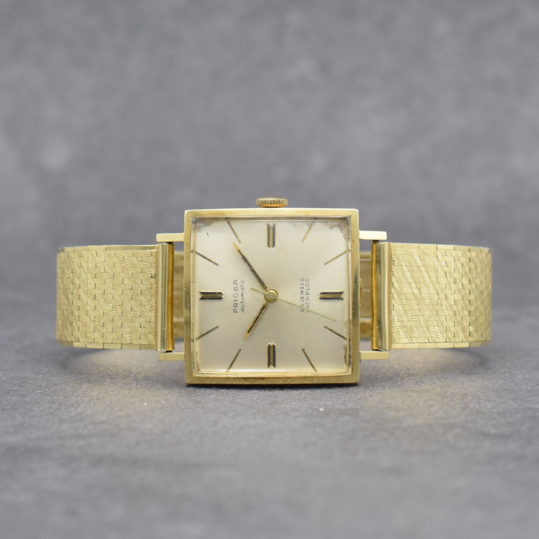 PRIOSA Herrenarmbanduhr in GG 585/000, Schweiz um 1965, Automatik, Boden aufgedr., Goldband in GG 585/000 später, silb. Zifferbl. korr., gold. ...