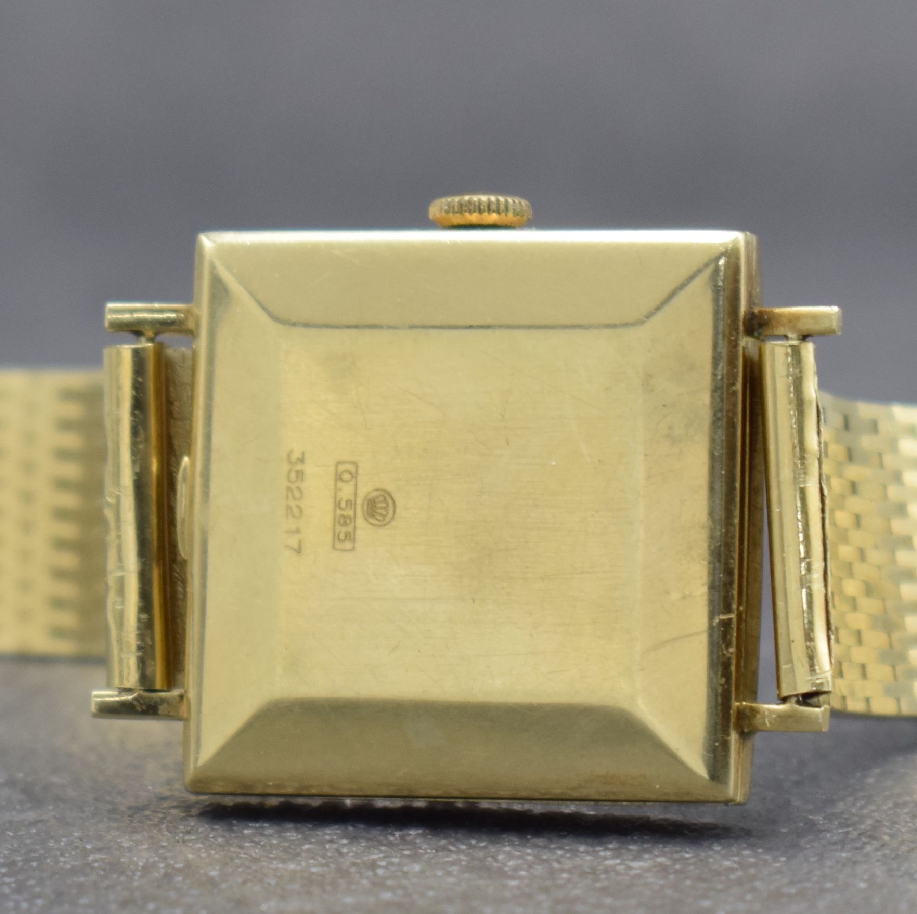 Detail e: PRIOSA Herrenarmbanduhr in GG 585/000, Schweiz um 1965, Automatik, Boden aufgedr., Goldband in GG 585/000 später, silb. Zifferbl. korr., gold. ...