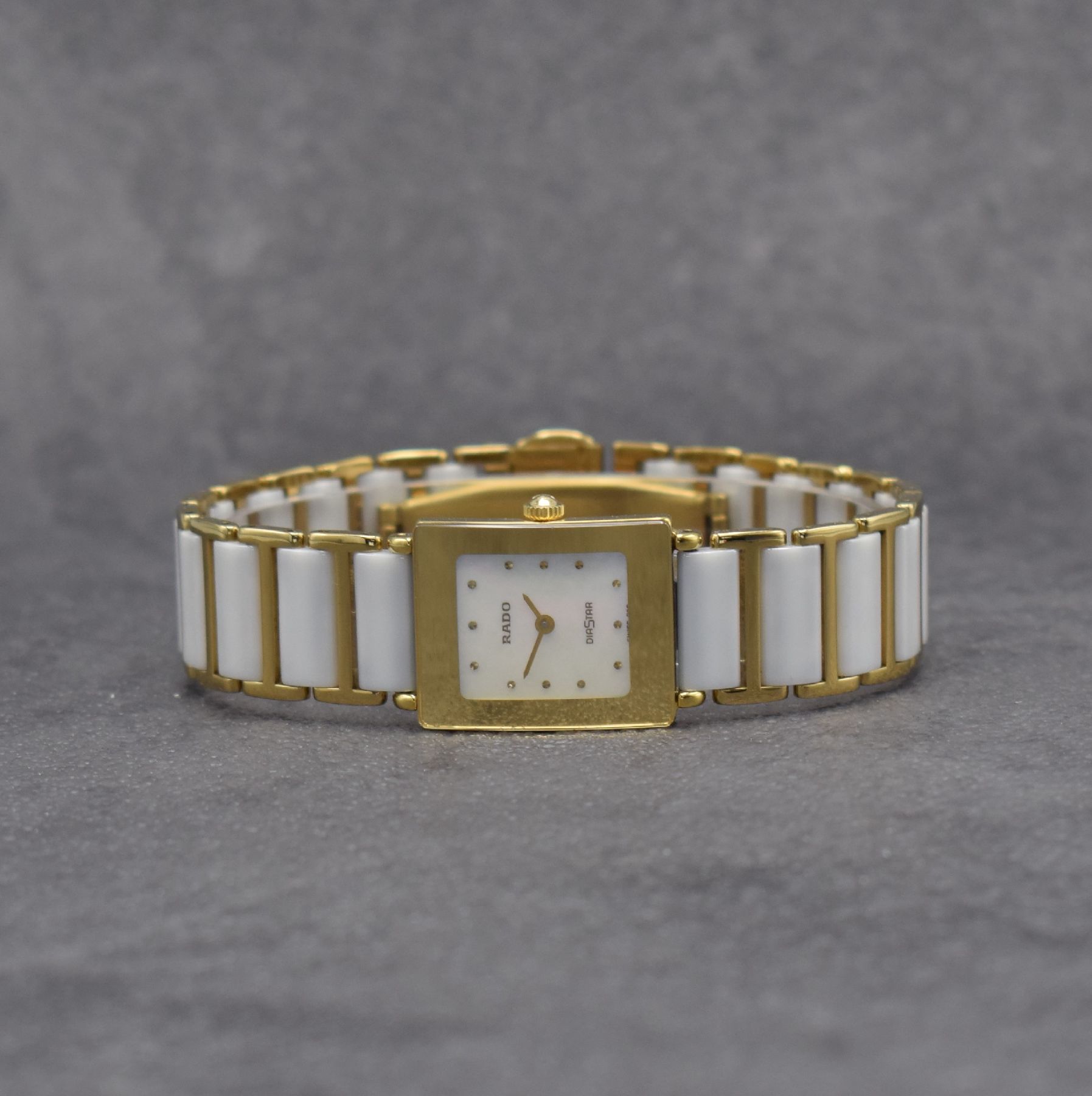 RADO Damenarmbanduhr Diastar, Schweiz um 2000, Ref. 153.0283.3N, verg. Geh., Gliederband m. weißen Keramikelementen & dopp. Faltschl., quarz, Boden ...