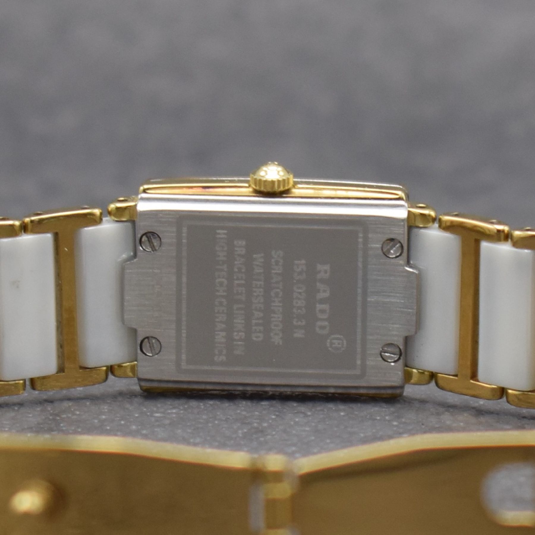 Detail f: RADO Damenarmbanduhr Diastar, Schweiz um 2000, Ref. 153.0283.3N, verg. Geh., Gliederband m. weißen Keramikelementen & dopp. Faltschl., quarz, Boden ...