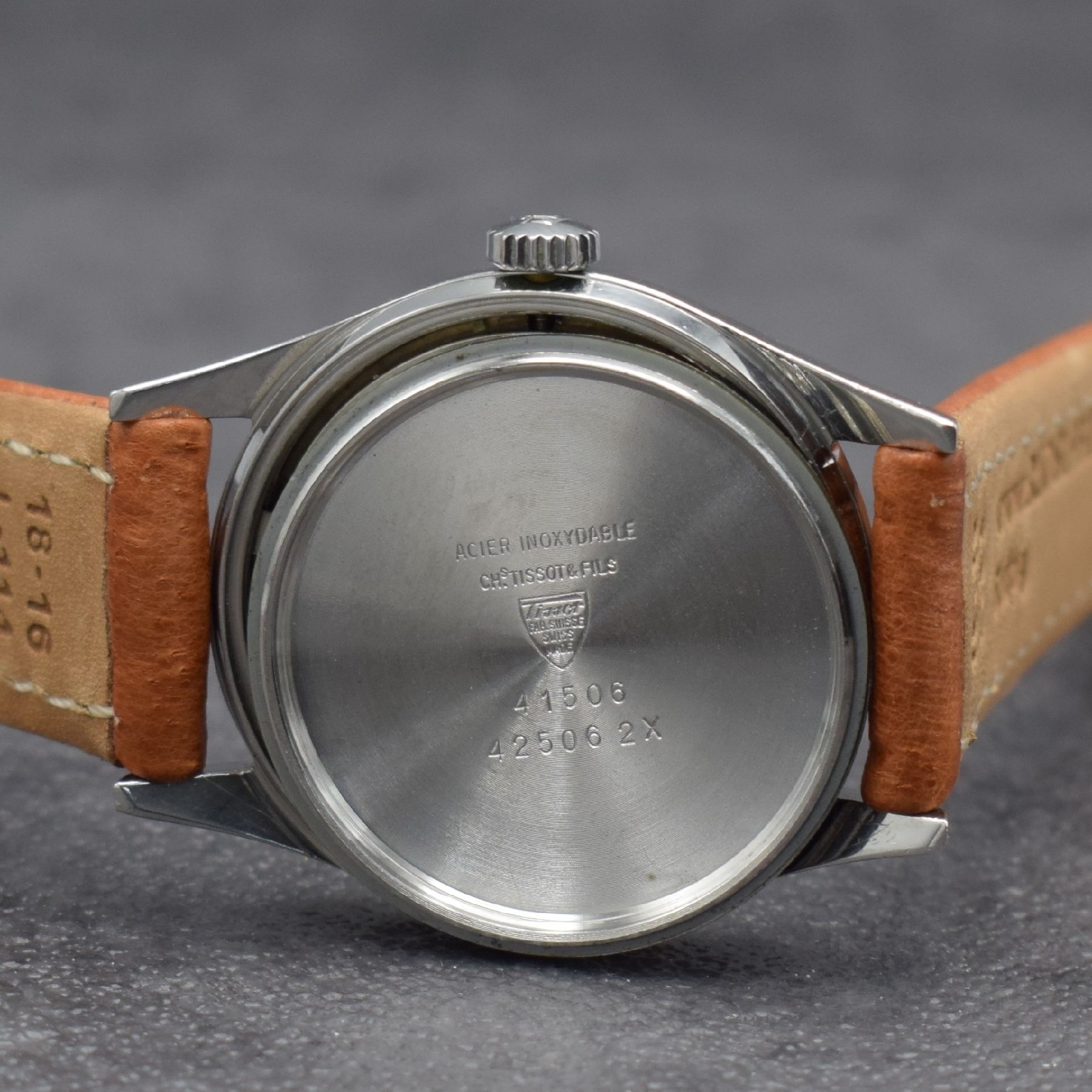 Detail g: TISSOT Seastar Herrenarmbanduhr in Stahl, Schweiz um 1960, Handaufzug, Ref. 41506, 2- teil. Geh., Boden m. entspr. Symbolik geschr., silb. Zifferbl. ...