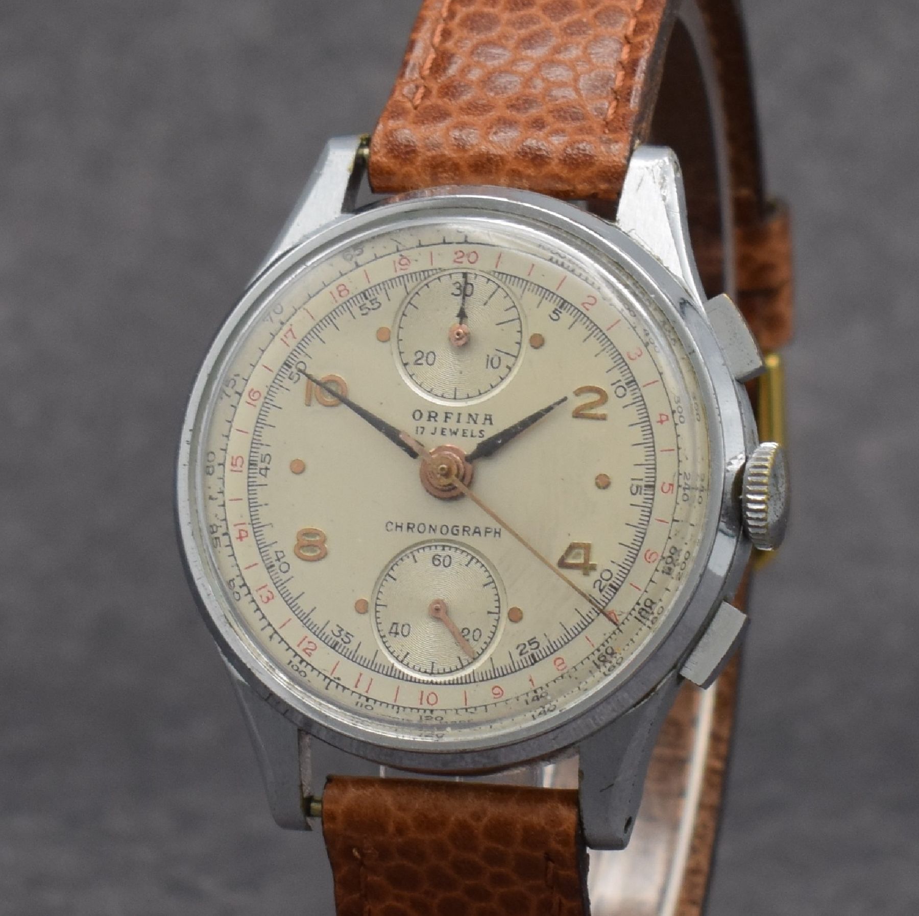 Detail c: ORFINA Herrenarmbanduhr mit Chronograph Kaliber Venus 170, Schweiz 1940er Jahre, verchr. Gehäuse, Glasrand & Stahlboden aufgedr., silb. Zifferbl. m. ...
