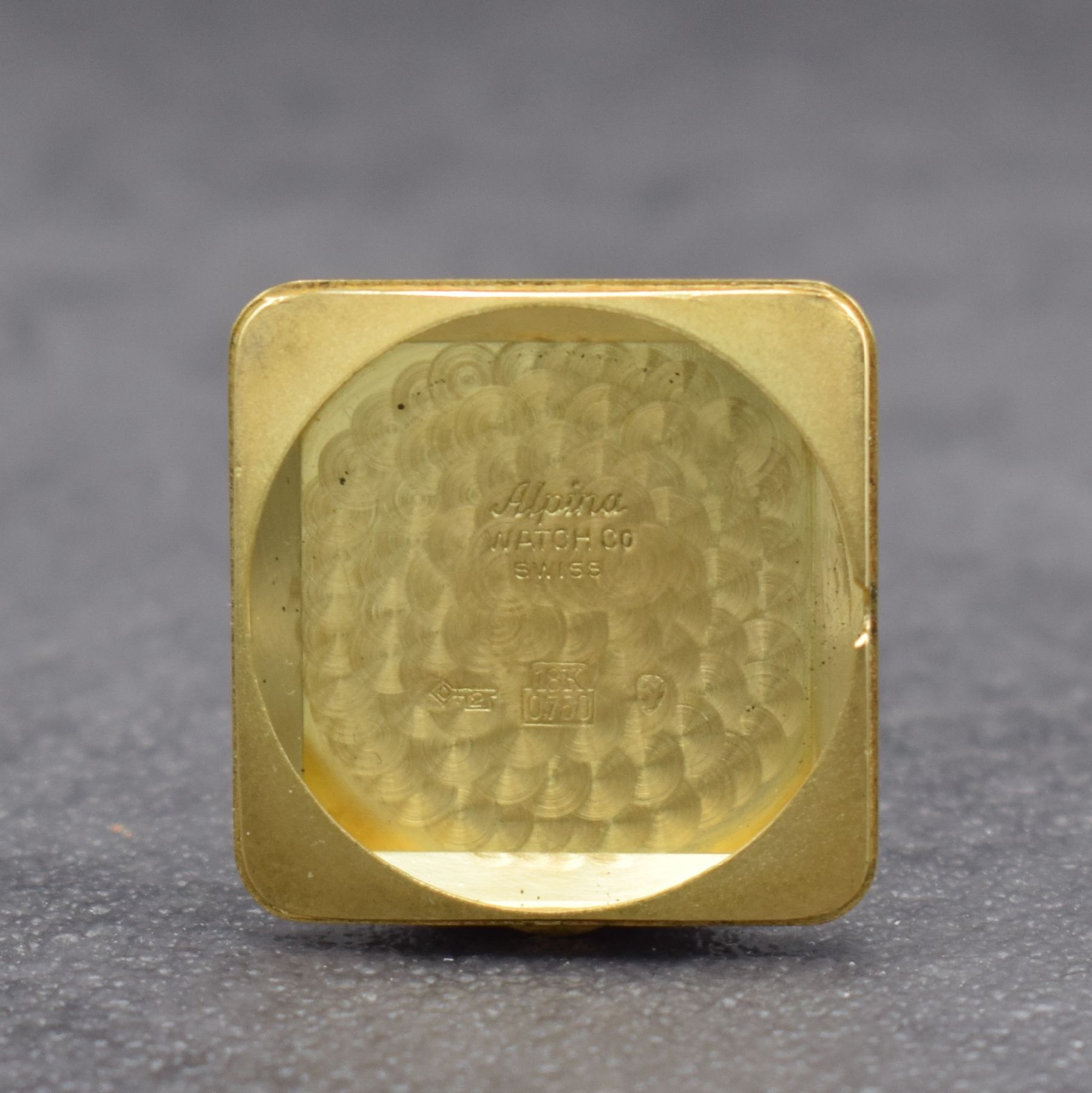 Detail g: ALPINA quadratische Herrenarmbanduhr in GG 750/000 mit Hammerautomatik, Schweiz um 1950, massives 2-teil. Geh., Boden aufgedr., silb. ...
