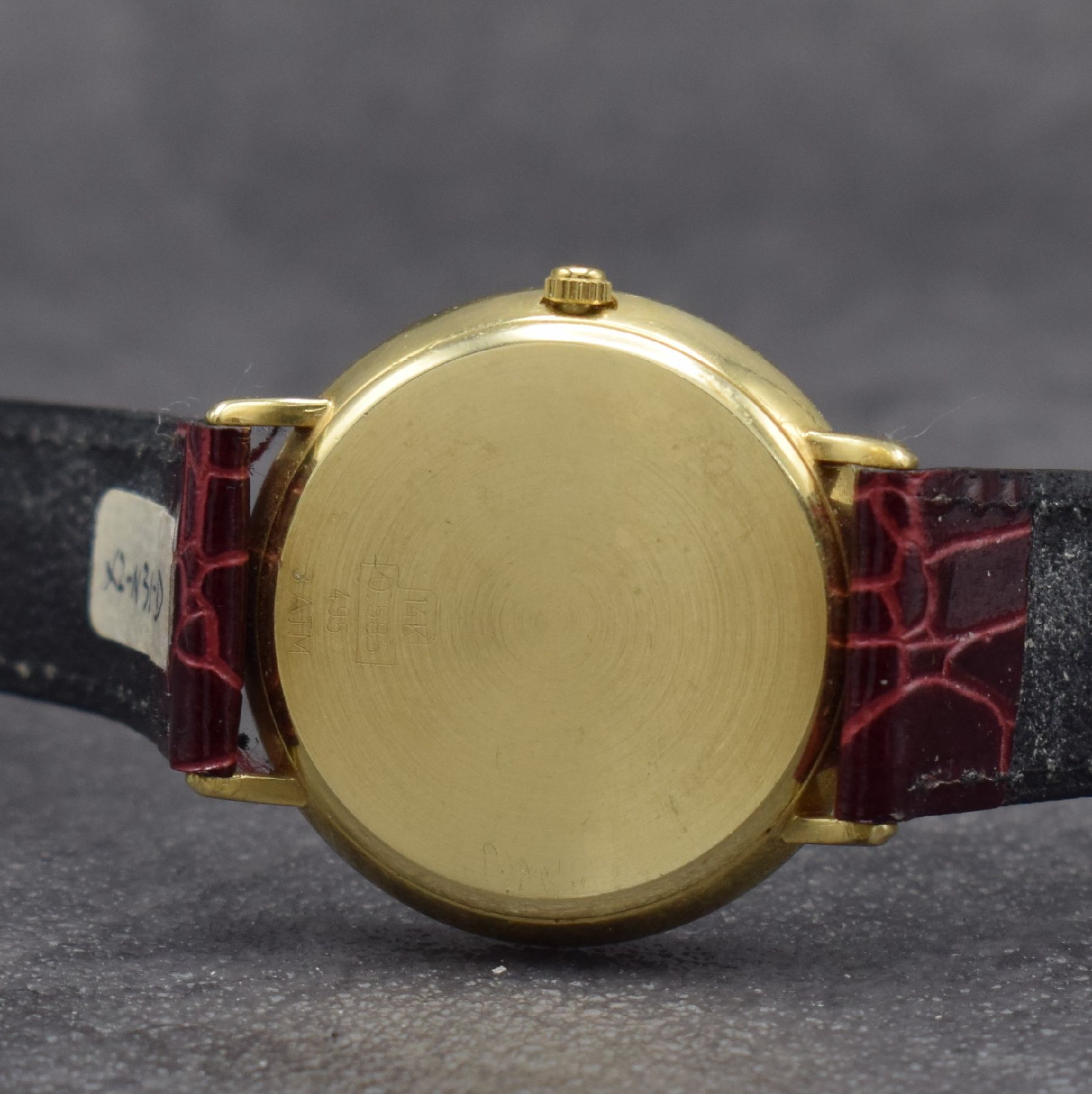 Detail d: PRIOSA Armbanduhr in GG 585/000 mit Mondphase, Schweiz um 1990, quarz, Boden aufgedr., weißes Zifferbl. m. gold. Indizes & Zeigern, Tag & Datum, D. ...