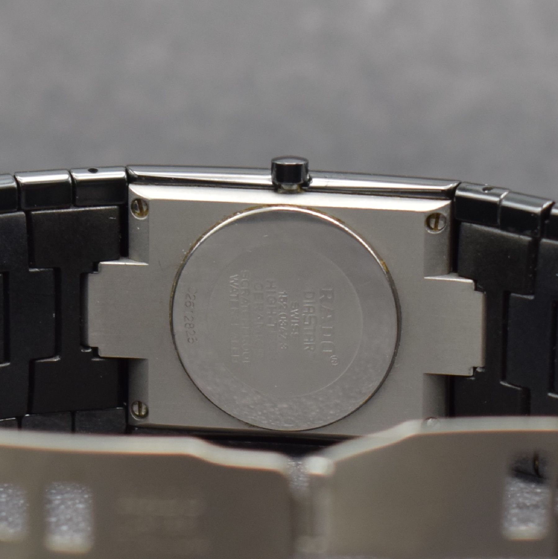 Detail e: RADO Diastar Armbanduhr, Schweiz um 2005, quarz, Ref. 152.0.47.3, Keramikgeh., Stahlboden aufgedr., Keramikband m. dopp. Faltschl., schwarzes ...