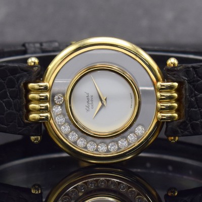 26256967a - CHOPARD 18k yellow gold ladies wristwatch Happy Diamonds reference 21/3029 1170, on both sides glazed case including original leather strap with gold-plated original buckle, in the inside 12 movable diamonds, display of hours & minutes, quartz, hand-setting on case-case back, diameter approx. 33 mm, condition 2-3