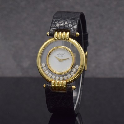 26256967b - CHOPARD 18k yellow gold ladies wristwatch Happy Diamonds reference 21/3029 1170, on both sides glazed case including original leather strap with gold-plated original buckle, in the inside 12 movable diamonds, display of hours & minutes, quartz, hand-setting on case-case back, diameter approx. 33 mm, condition 2-3