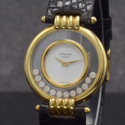 26256967c - CHOPARD 18k yellow gold ladies wristwatch Happy Diamonds reference 21/3029 1170, on both sides glazed case including original leather strap with gold-plated original buckle, in the inside 12 movable diamonds, display of hours & minutes, quartz, hand-setting on case-case back, diameter approx. 33 mm, condition 2-3