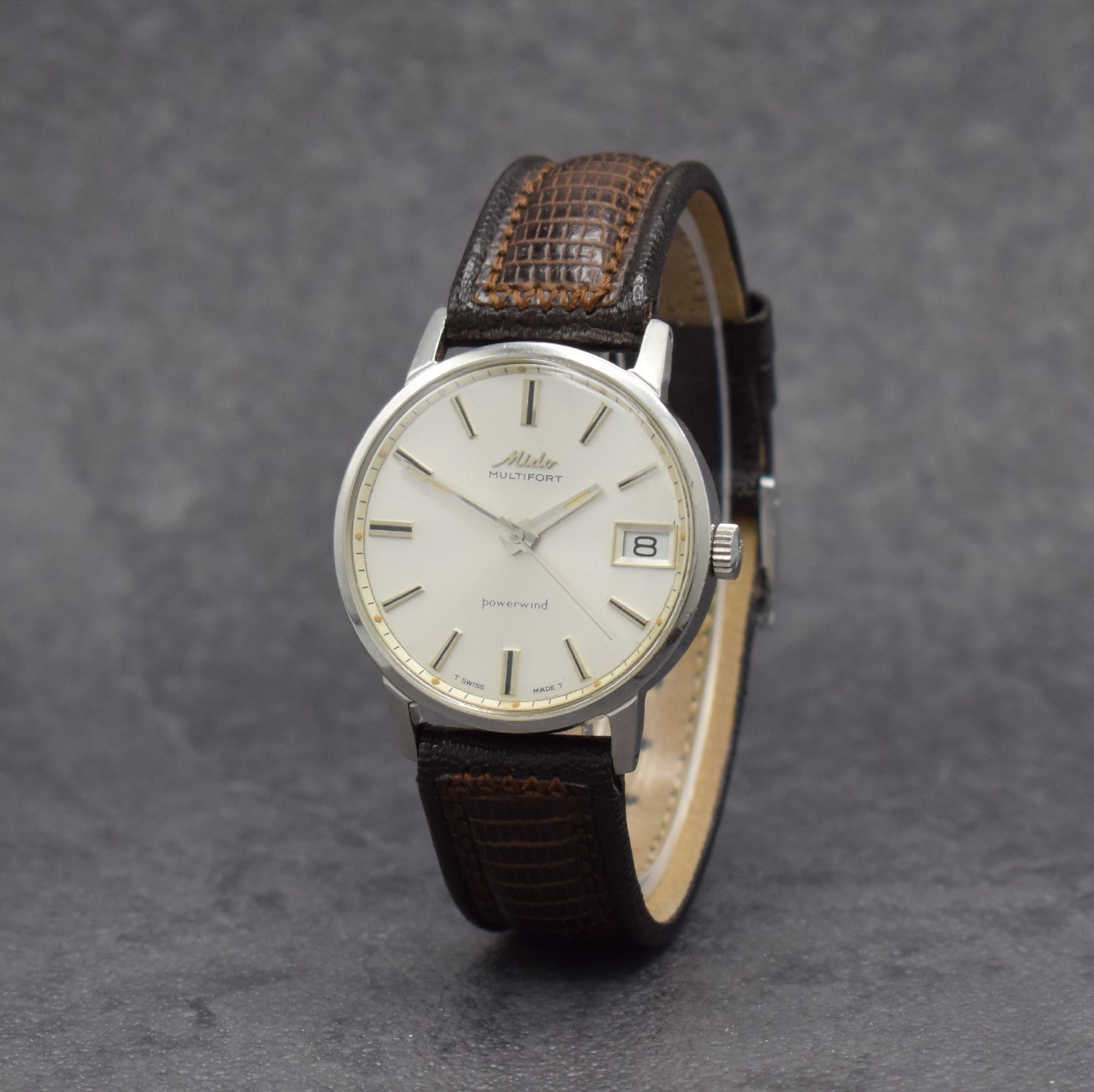 Detail b: MIDO Multifort Herrenarmbanduhr in Stahl, Schweiz um 1965, Automatik, Boden geschr., silb. Zifferbl. m. aufges. Std.-Ind., silb. Zeiger, Datum, verg. ...