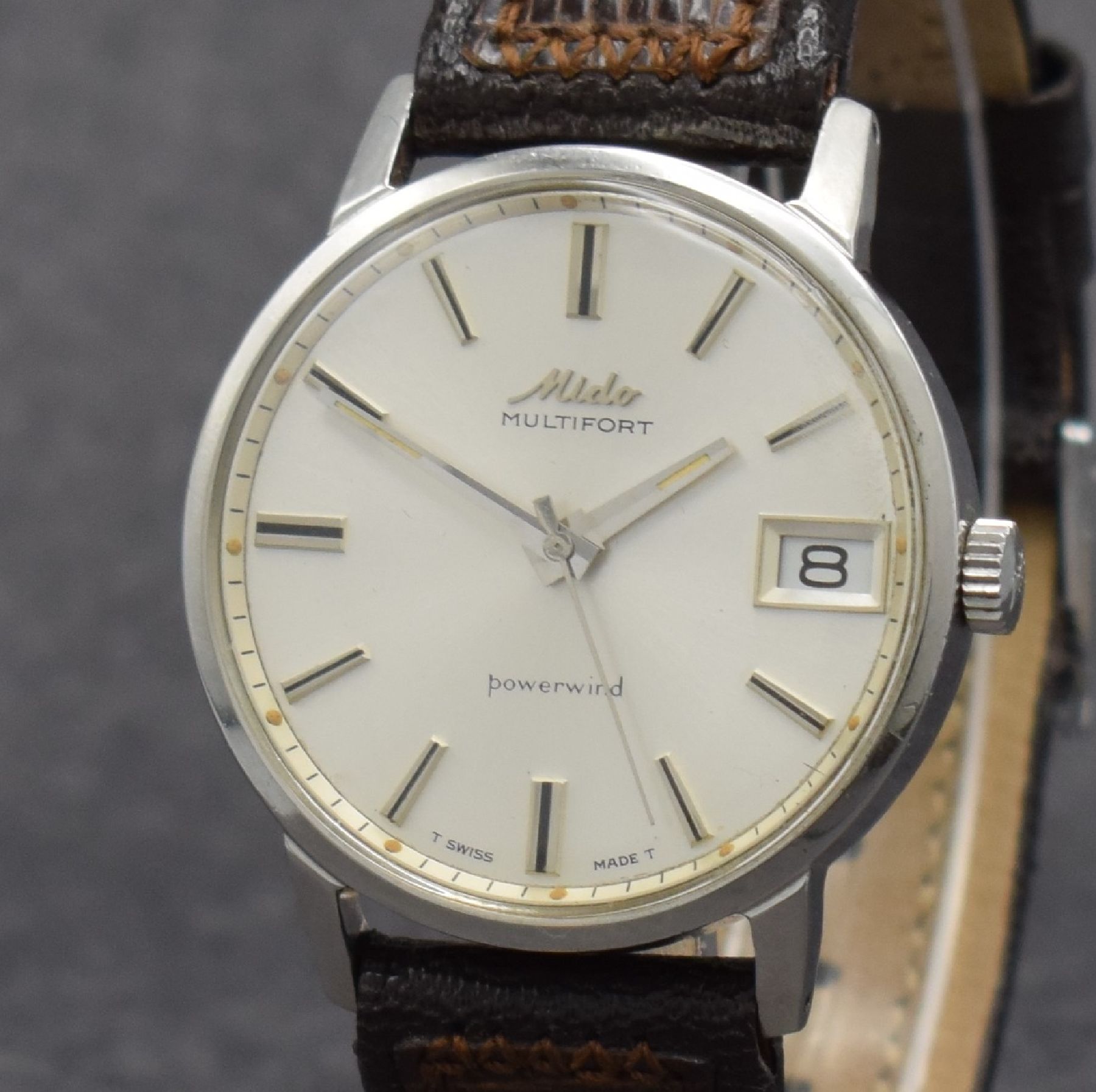 Detail c: MIDO Multifort Herrenarmbanduhr in Stahl, Schweiz um 1965, Automatik, Boden geschr., silb. Zifferbl. m. aufges. Std.-Ind., silb. Zeiger, Datum, verg. ...