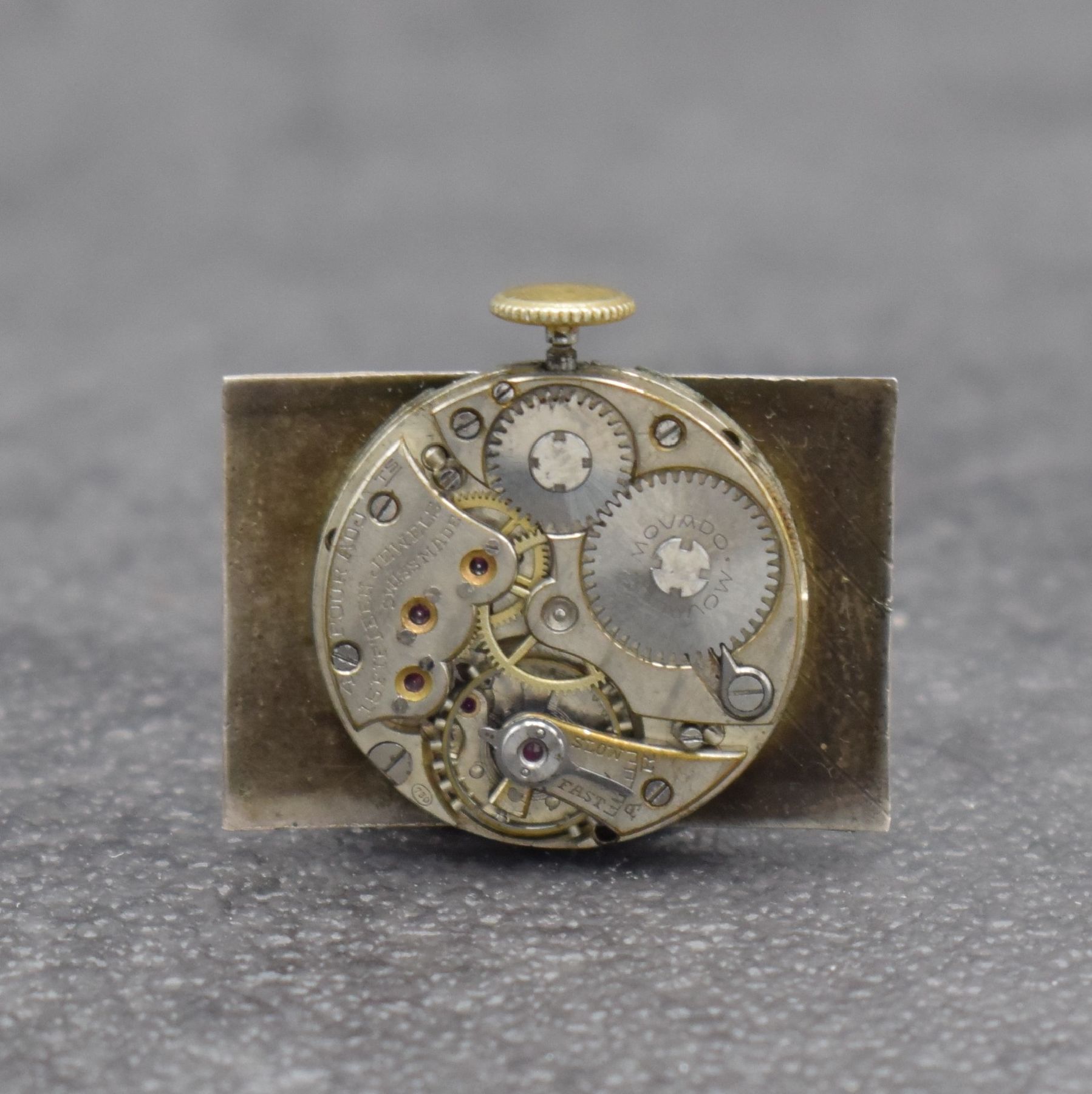 Detail f: MOVADO Herrenarmbanduhr in GG 750/000, Schweiz um 1930, Handaufzug, 2-teil. Scharniergeh., Zifferbl. m. arab. Zahlen rest., schwarze Zeiger, Kal. ...