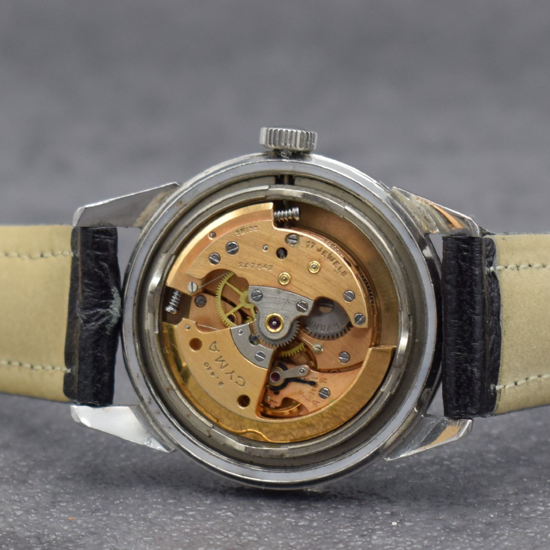 Detail d: Konvolut: 3 Herrenarmbanduhren, Schweiz um 1950 - 1960, 1) RECORD Watch Co, Automatik, verchr. Geh., Kal. 174, D. ca. 37 mm, 2) CYMA Cymaflex, ...