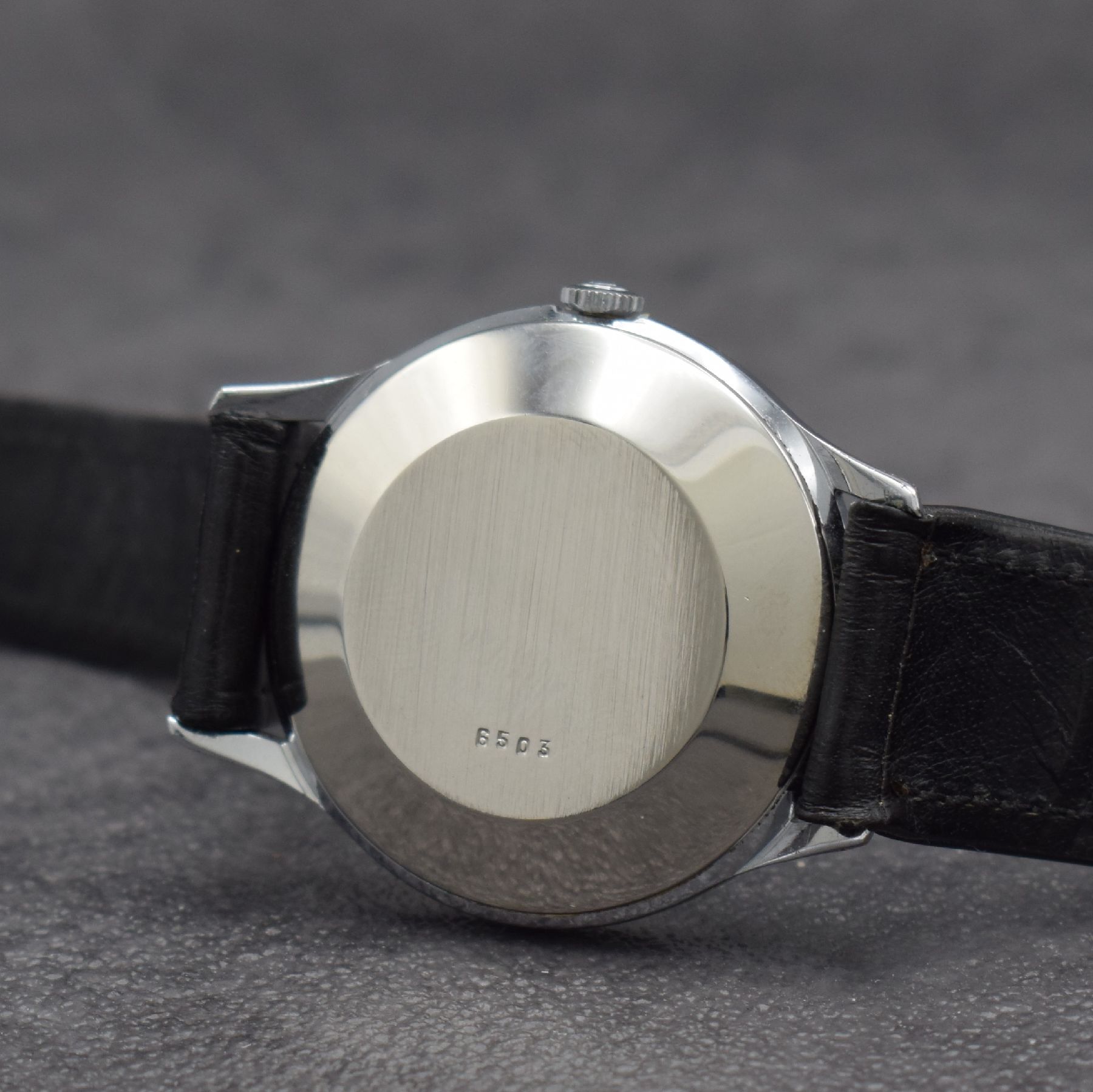 Detail i: Konvolut: 3 Herrenarmbanduhren, Schweiz um 1950 - 1960, 1) RECORD Watch Co, Automatik, verchr. Geh., Kal. 174, D. ca. 37 mm, 2) CYMA Cymaflex, ...