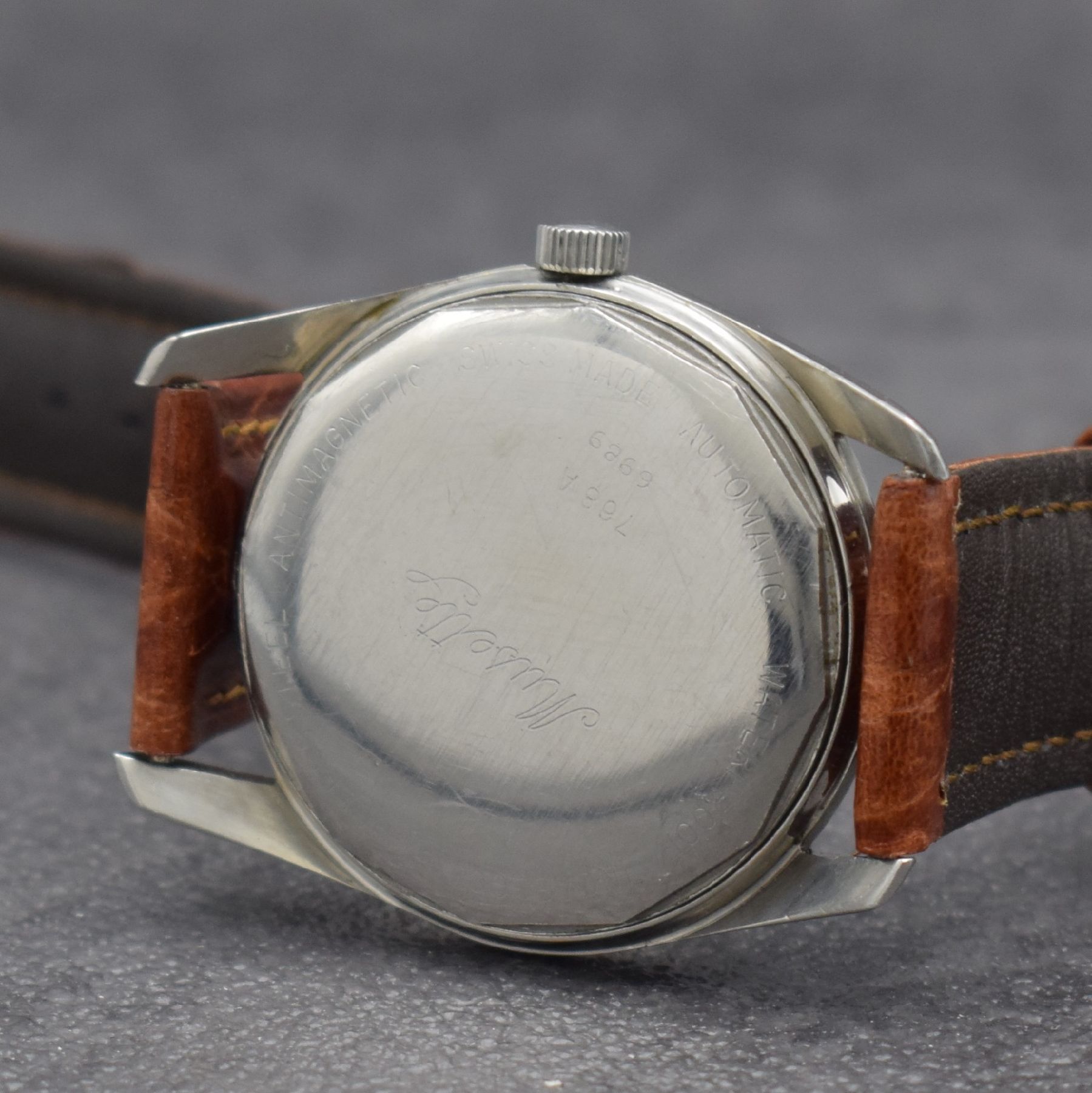Detail n: Konvolut: 3 Herrenarmbanduhren, Schweiz um 1950 - 1960, 1) RECORD Watch Co, Automatik, verchr. Geh., Kal. 174, D. ca. 37 mm, 2) CYMA Cymaflex, ...