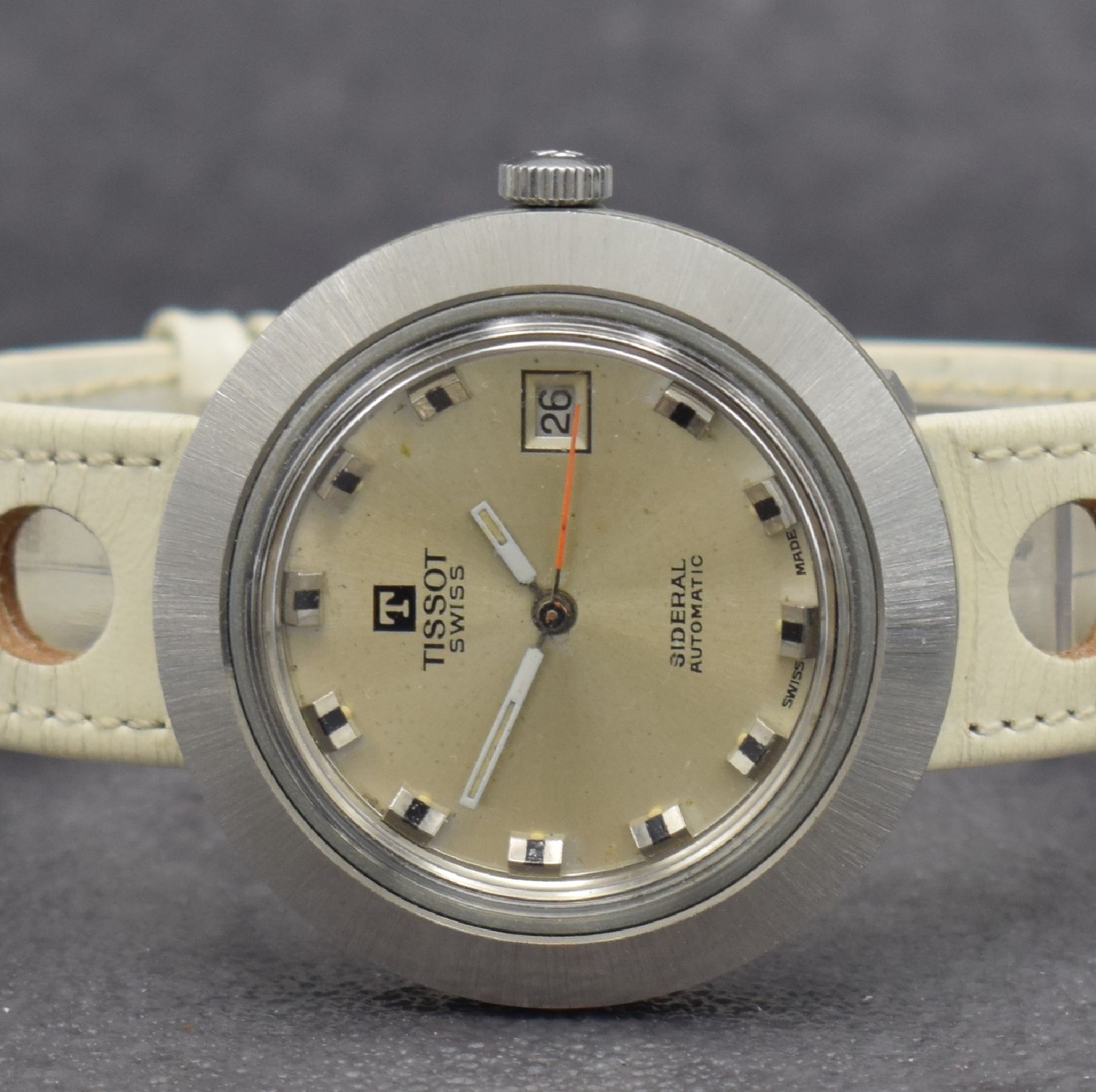 Detail a: TISSOT Sideral Herrenarmbanduhr, Schweiz um 1970, Automatik, Fiberglas-Geh., verchr. Lünette, silb. Zifferbl. m. aufges. Std.-Ind. fl., weiße ...