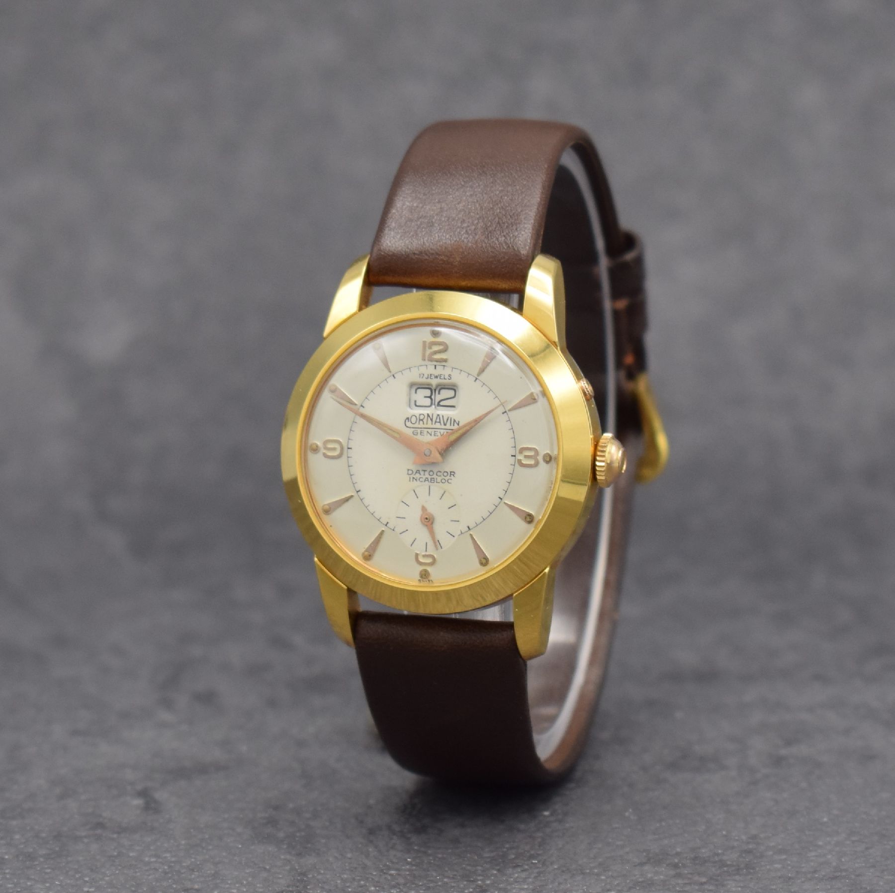 Detail b: CORNAVIN Datocor Armbanduhr mit Großdatum, Schweiz um 1950, Handaufzug, verg. Gehäuse, Stahlboden aufgedr., Korrekturdr. b. 2, silb. ...