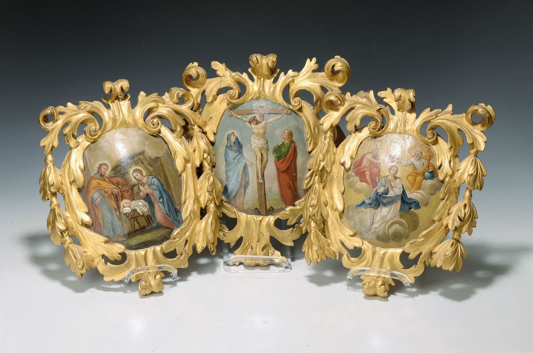 Drei Andachtsgemälde, süddeutsch, 18. Jh., Öl/Holz, konkave Bildfläche, von barockem Rocaillendecor gerahmt, vergoldet, Geburt Christi, ...