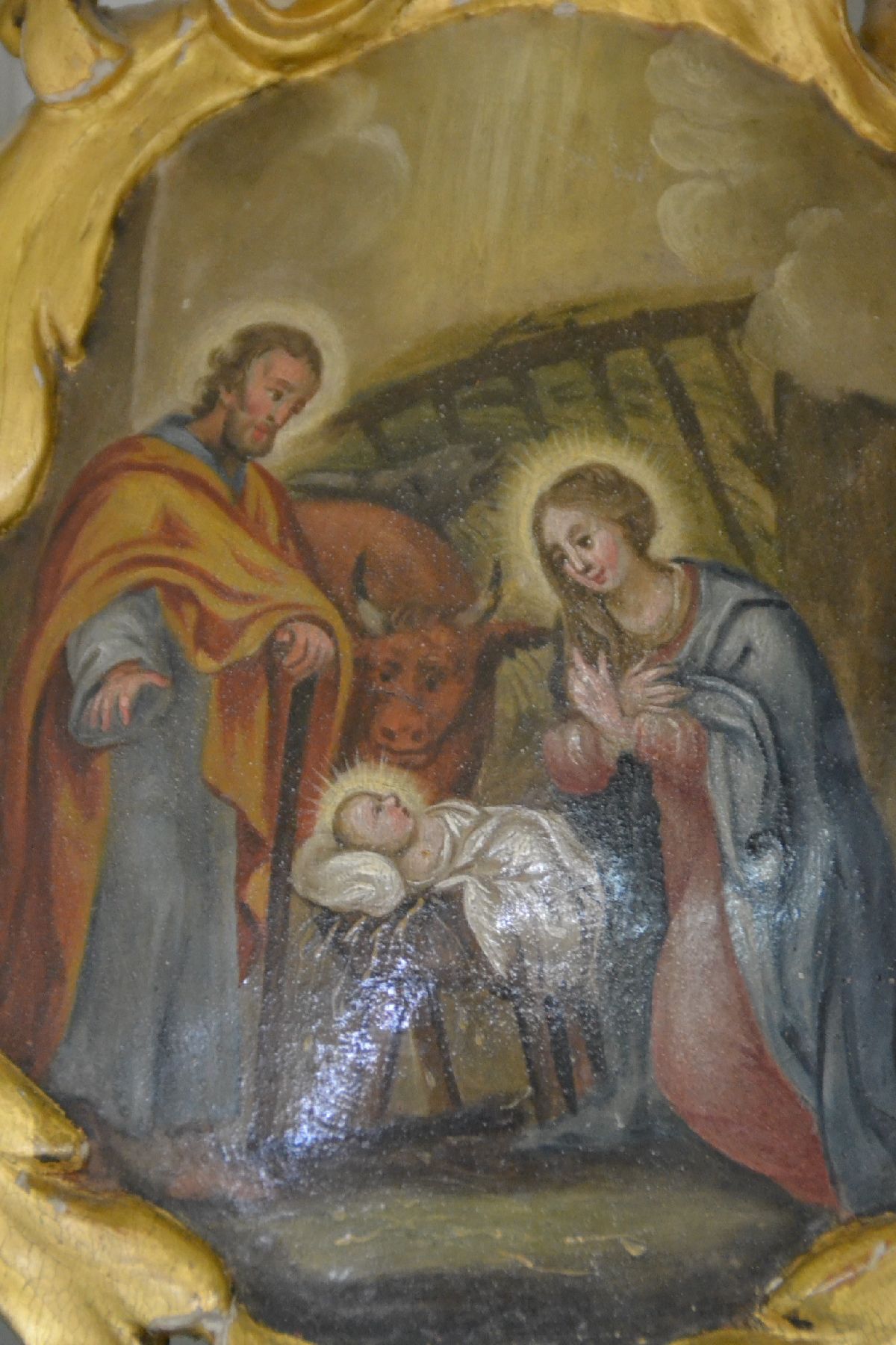 Detail c: Drei Andachtsgemälde, süddeutsch, 18. Jh., Öl/Holz, konkave Bildfläche, von barockem Rocaillendecor gerahmt, vergoldet, Geburt Christi, ...