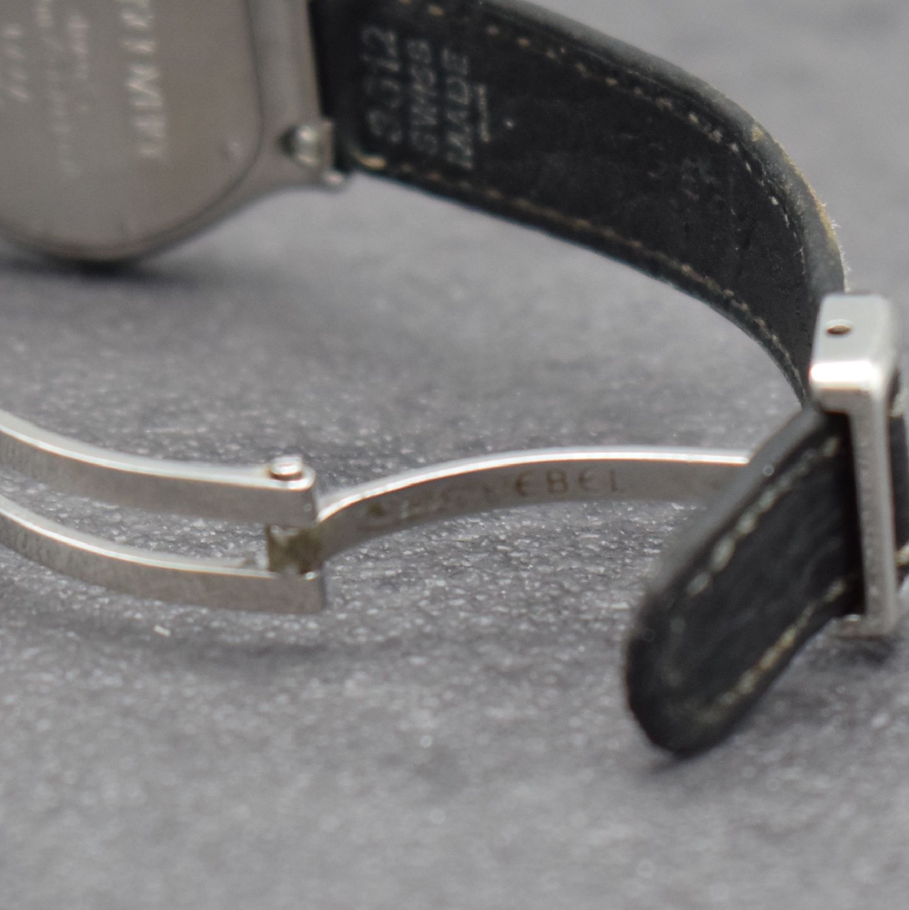 Detail e: EBEL Damenarmbanduhr Serie Discovery Referenz 983912, Schweiz um 1997, Edelstahlgeh. inkl. orig. Lederband m. orig. Faltschl., quarz, Boden 8-fach ...