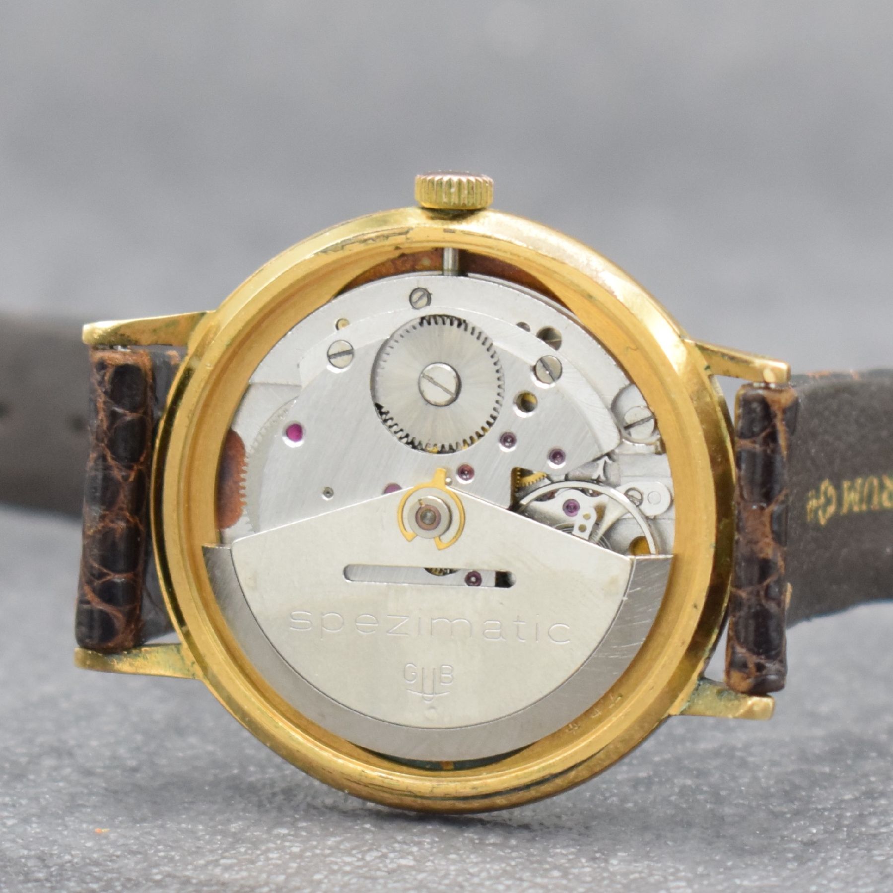 Detail d: GLASHÜTTE Spezimatic vergoldete Herrenarmbanduhr, Deutschland um 1965, Automatik, 2 tlg.-Geh., Edelstahlboden aufgedr., gold. Zifferbl. m. gold. ...