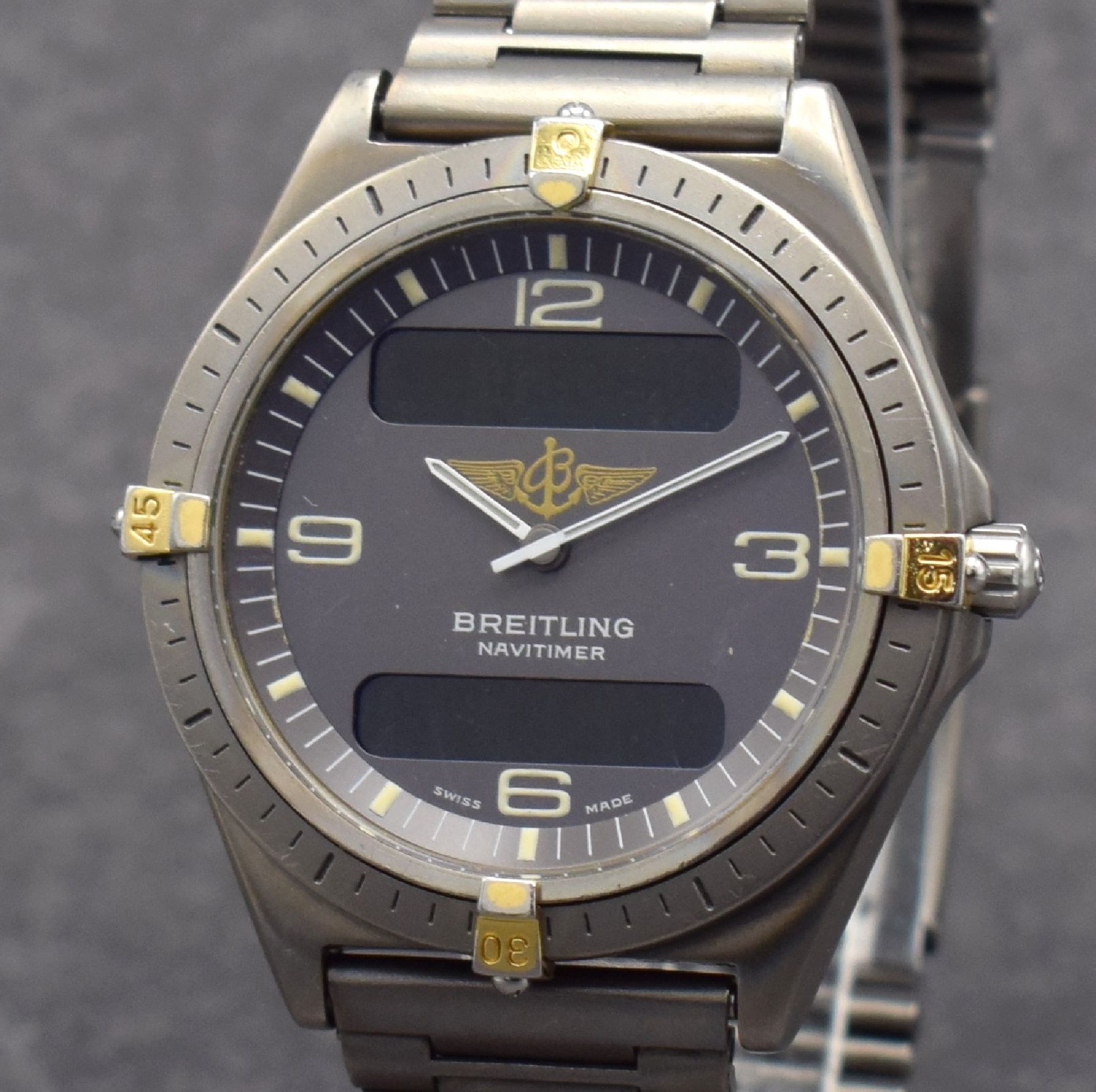Detail c: BREITLING Herrenarmbanduhr Navitimer Aerospace mit Multifunktionsanzeige, Schweiz um 1995, Ref. 80360, Titangeh. inkl. Gliederband m. Faltschl., ...