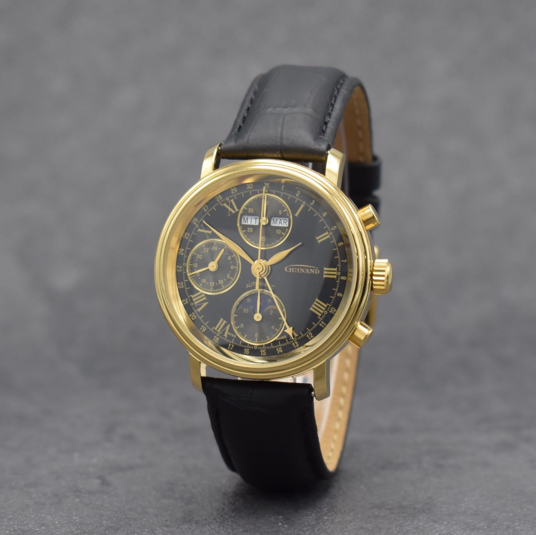 Detail b: GUINAND nahezu neuwertige Herrenarmbanduhr mit Chronograph & Kalender, Schweiz um 2000, Automatik, verg. Geh. beids. vergl., Stahlboden geschr., ...
