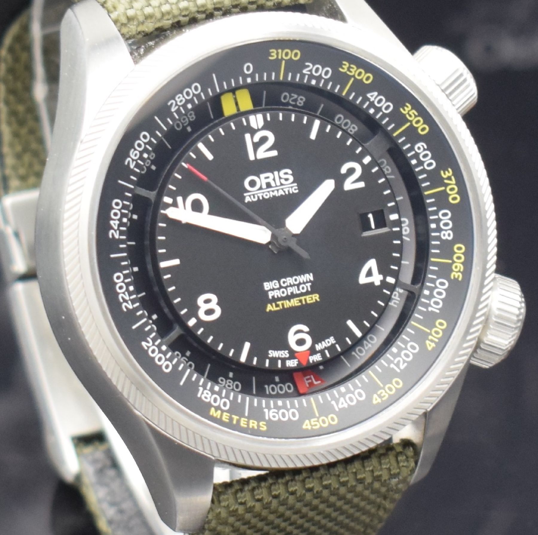 Detail d: ORIS Herrenarmbanduhr Big Crown Propilot Altimester Referenz 01 733 7705 4164, Automatik, massives Edelstahlgeh. inkl. orig. Band m. Faltschl., Boden ...