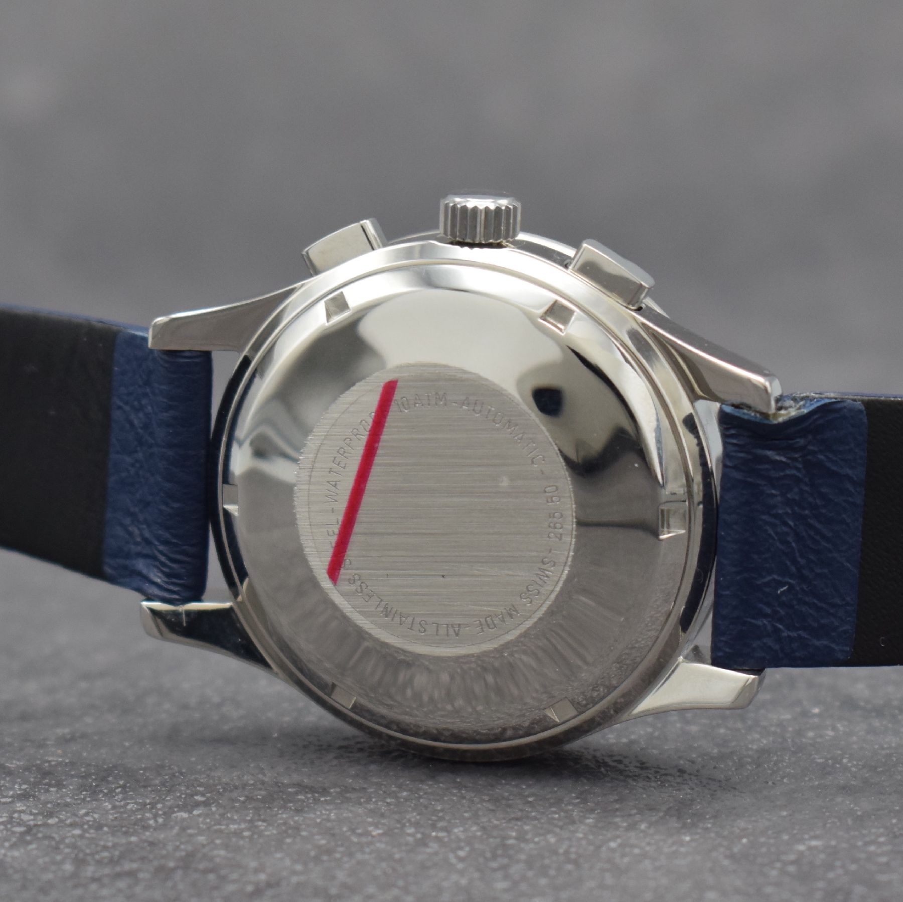 Detail d: GUINAND nahezu neuwertige Herrenarmbanduhr mit Chronograph, Schweiz um 2000, Automatik, verschr. Geh. in Edelstahl, blaues Zifferbl. m. aufges. gold. ...