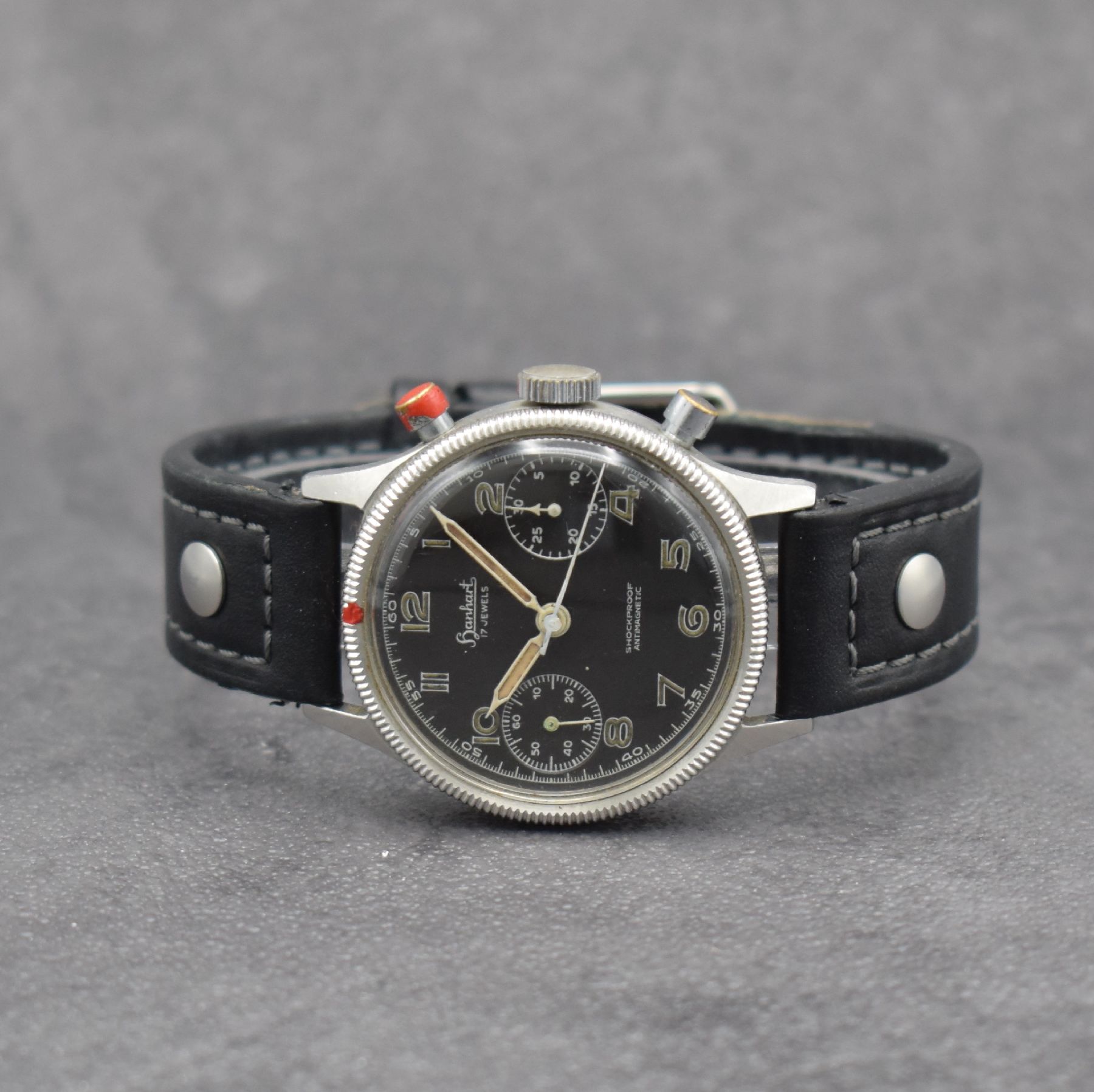 HANHART Flyback Fliegerchronograph der Bundeswehr Type 417, Deutschland um 1960, Handaufzug, Stahl-Geh. mit Vers.-Nr. 6645- 12-120-4858, geriffelte ...