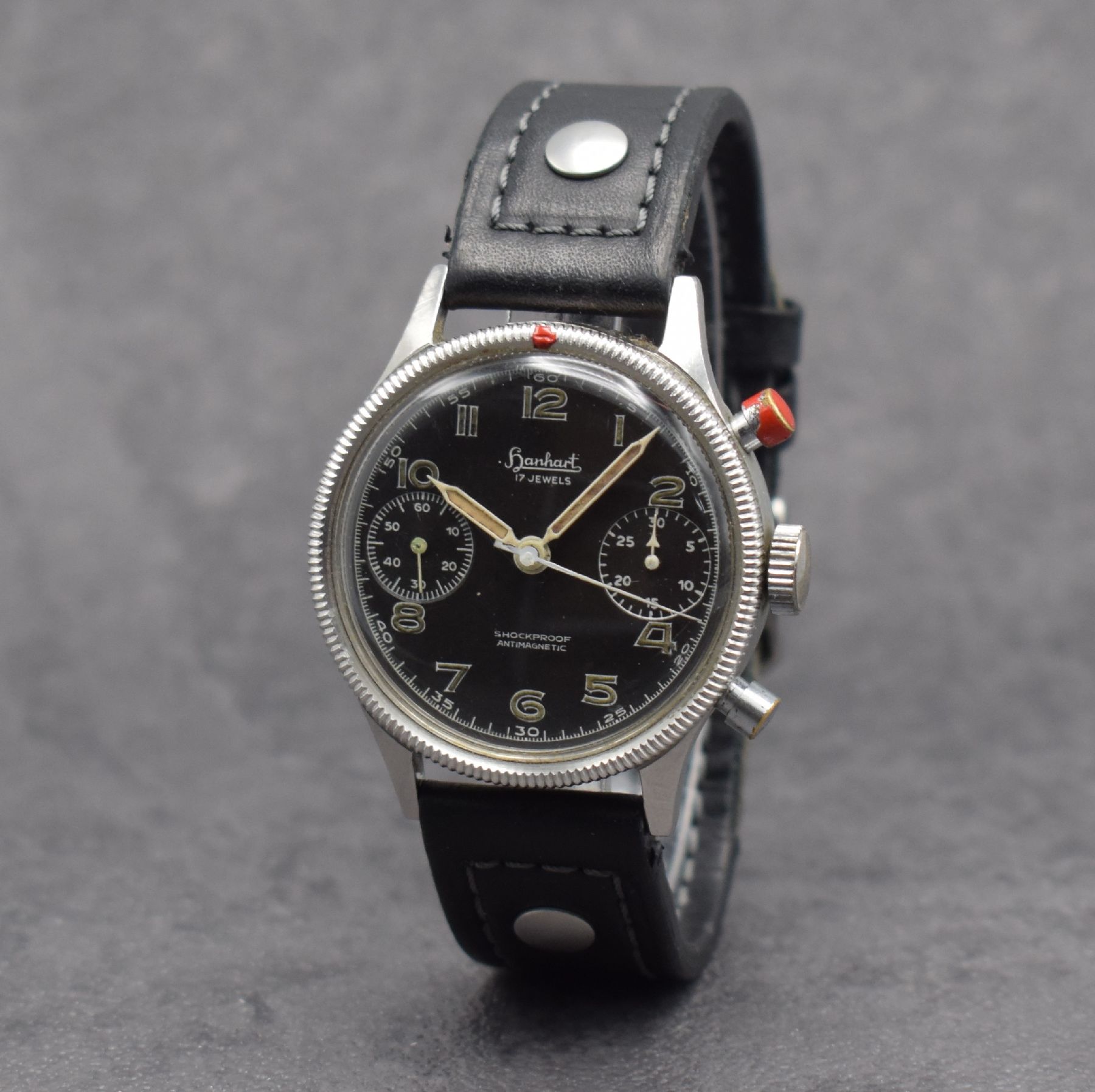 Detail b: HANHART Flyback Fliegerchronograph der Bundeswehr Type 417, Deutschland um 1960, Handaufzug, Stahl-Geh. mit Vers.-Nr. 6645- 12-120-4858, geriffelte ...