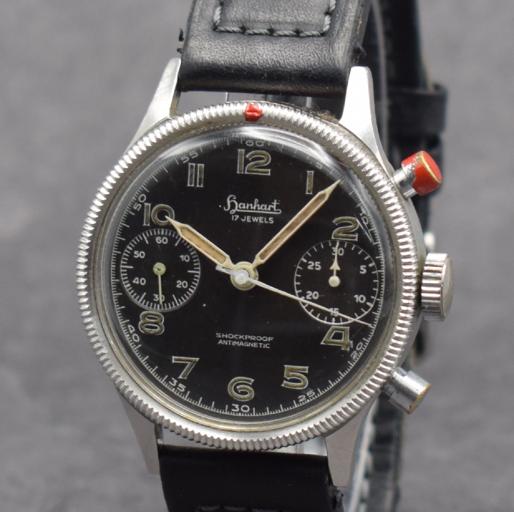 Detail c: HANHART Flyback Fliegerchronograph der Bundeswehr Type 417, Deutschland um 1960, Handaufzug, Stahl-Geh. mit Vers.-Nr. 6645- 12-120-4858, geriffelte ...
