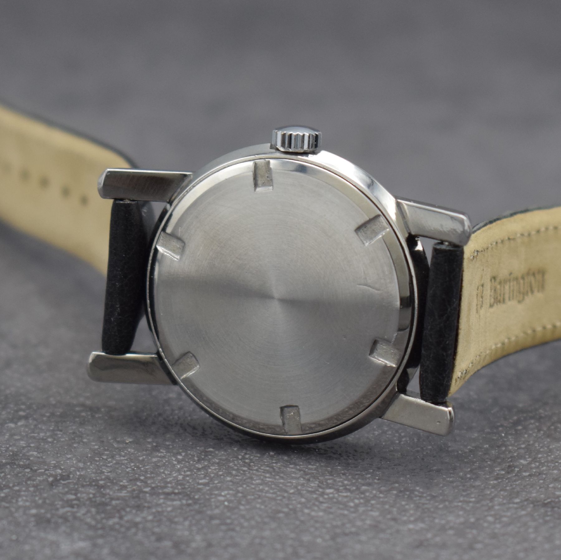 Detail d: EBERHARD & Co. Armbanduhr, Handaufzug, Schweiz um 1950, 3-teil. Edelstahlgeh., Boden verschr., Glasrand aufgedr., silb. Zifferbl. altersbed. get., ...