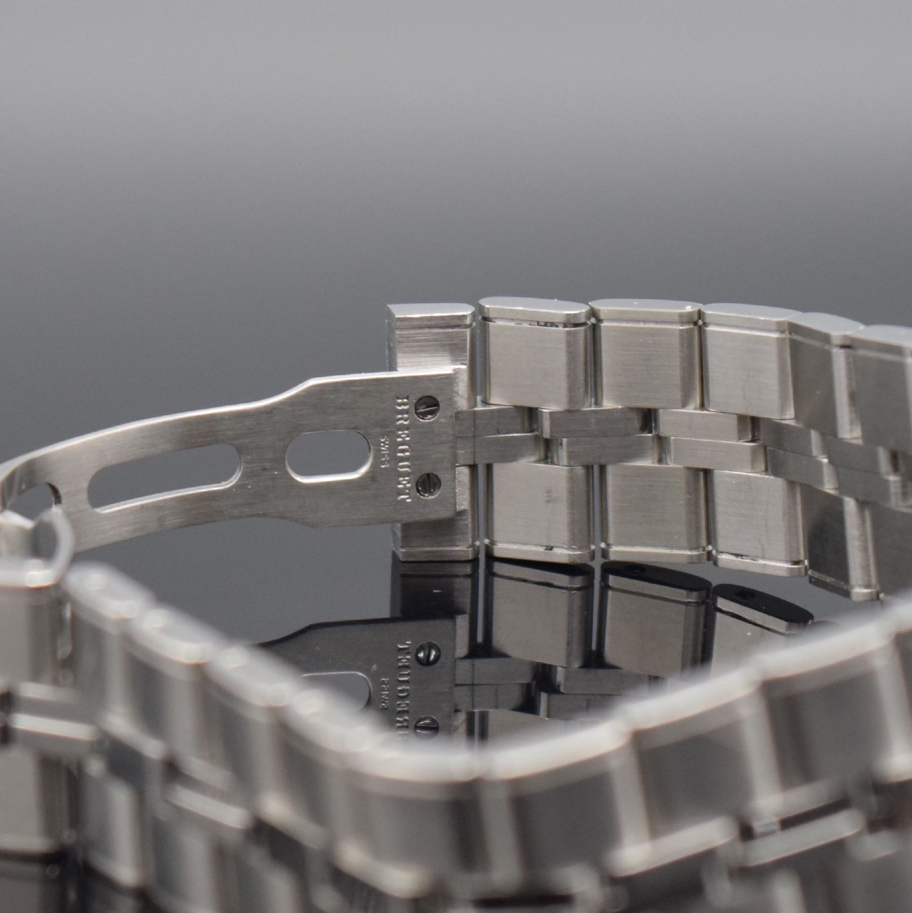 Detail d: BREGUET Marine Herrenarmbanduhr Referenz 5817, Automatik, Schweiz um 2010, Edelstahlgeh. inkl. Gliederband m. Faltschl., zus. orig. Kautschukband m. ...