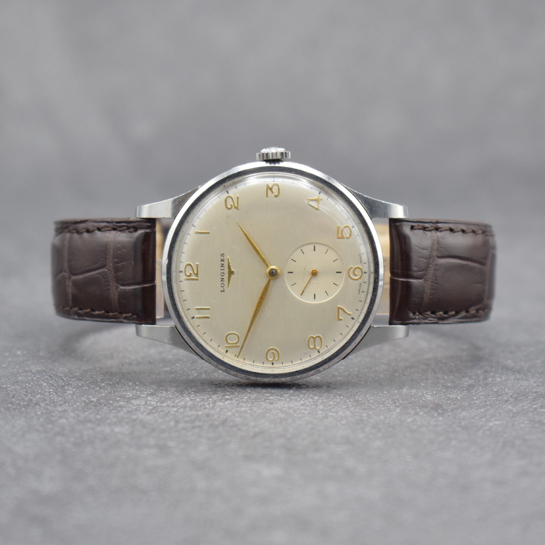 LONGINES große Herrenarmbanduhr 38 mm in Stahl, Schweiz um 1953, Handaufzug, Ref. 4914, 3-teil. Gehäuse, Boden & Glasrand aufgedr., orig. Krone, ...