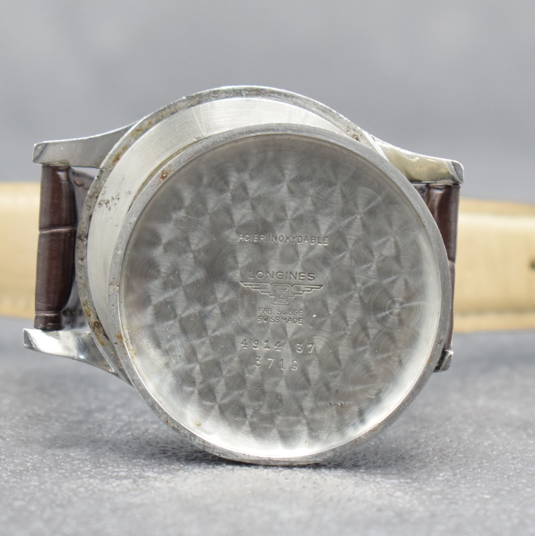 Detail i: LONGINES große Herrenarmbanduhr 38 mm in Stahl, Schweiz um 1953, Handaufzug, Ref. 4914, 3-teil. Gehäuse, Boden & Glasrand aufgedr., orig. Krone, ...