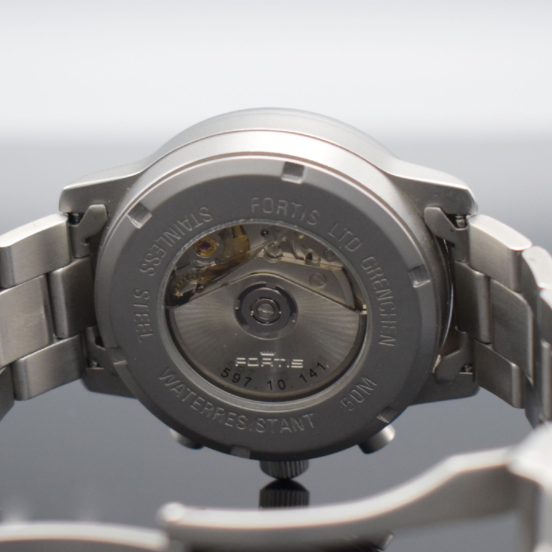Detail f: FORTIS Herrenarmbanduhr mit Chronograph, Schweiz um 1995, Automatik, beids. vergl. Gehäuse, Boden geschr., Gliederband m. Faltschl., schwarzes ...
