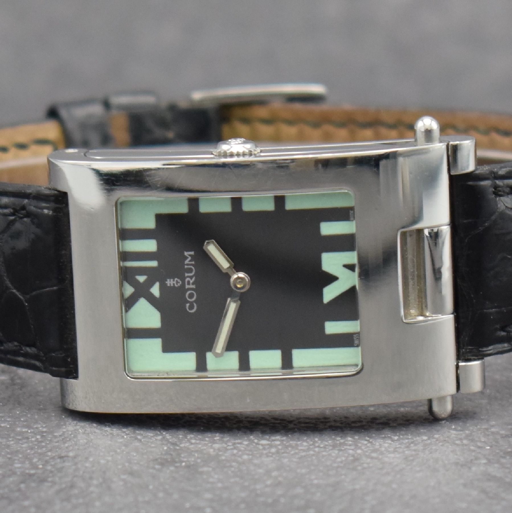 Detail a: CORUM Armbanduhr Serie Tabogan, Schweiz um 2000, Ref. 64.151.20, Edelstahlgeh. inkl. orig. Lederband m. orig. Dornschl., Oberteil zur Zeigerst. ...