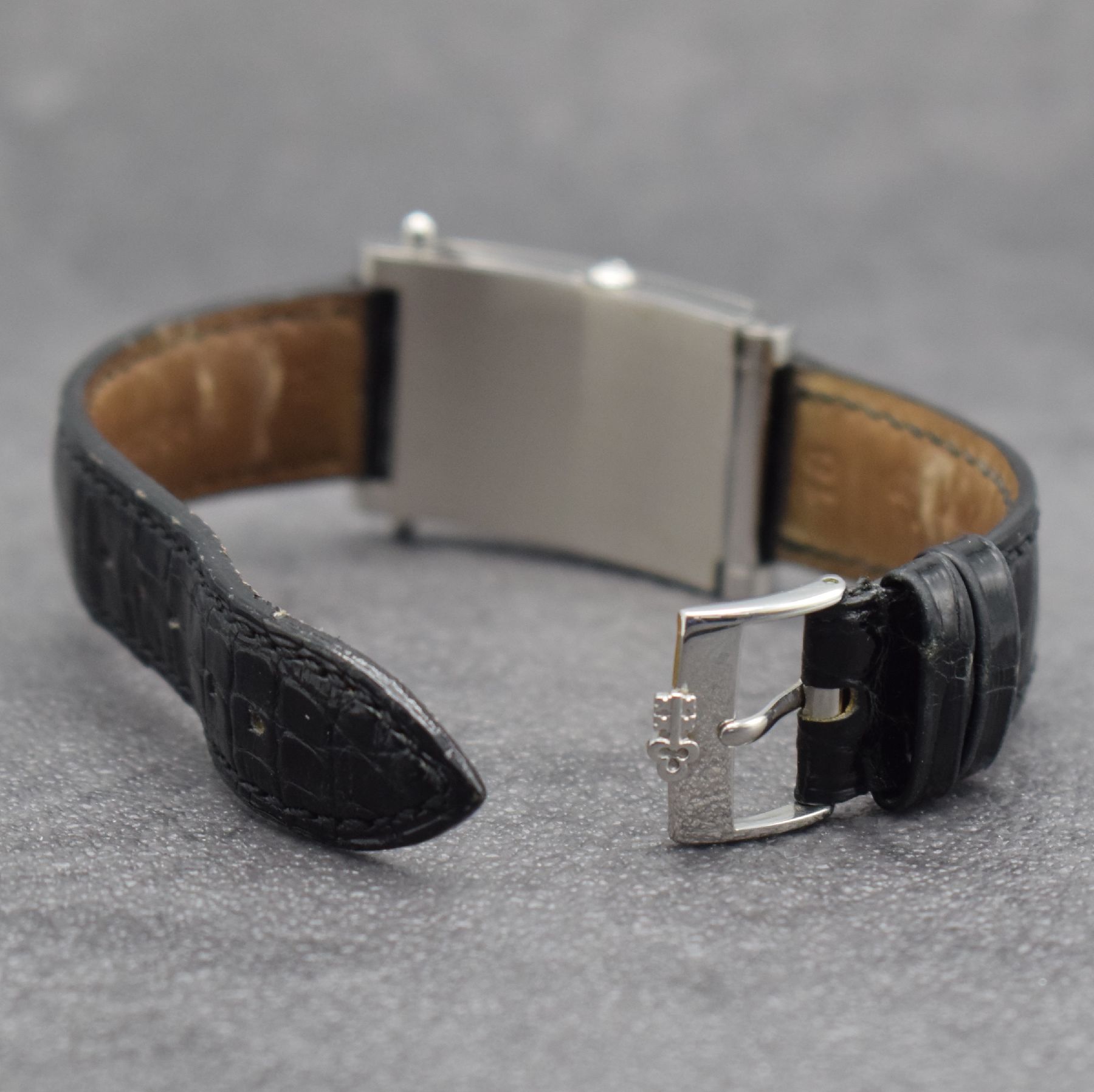 Detail d: CORUM Armbanduhr Serie Tabogan, Schweiz um 2000, Ref. 64.151.20, Edelstahlgeh. inkl. orig. Lederband m. orig. Dornschl., Oberteil zur Zeigerst. ...