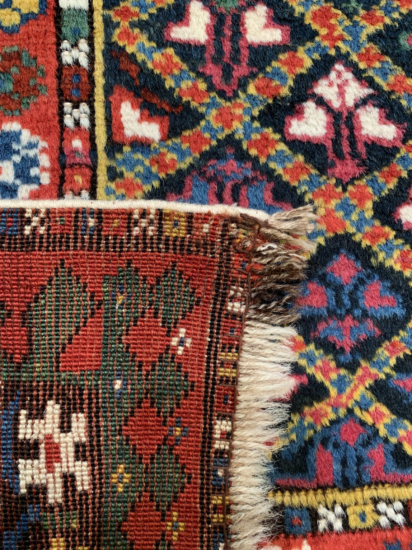 Detail c: Antiker Gendje Kazak, Zentralkaukasus, 19 Jhd., Wolle geknüpft auf Wolle, ca. 230 x 107 cm, EHZ: 2-3, (guter Zustand)
