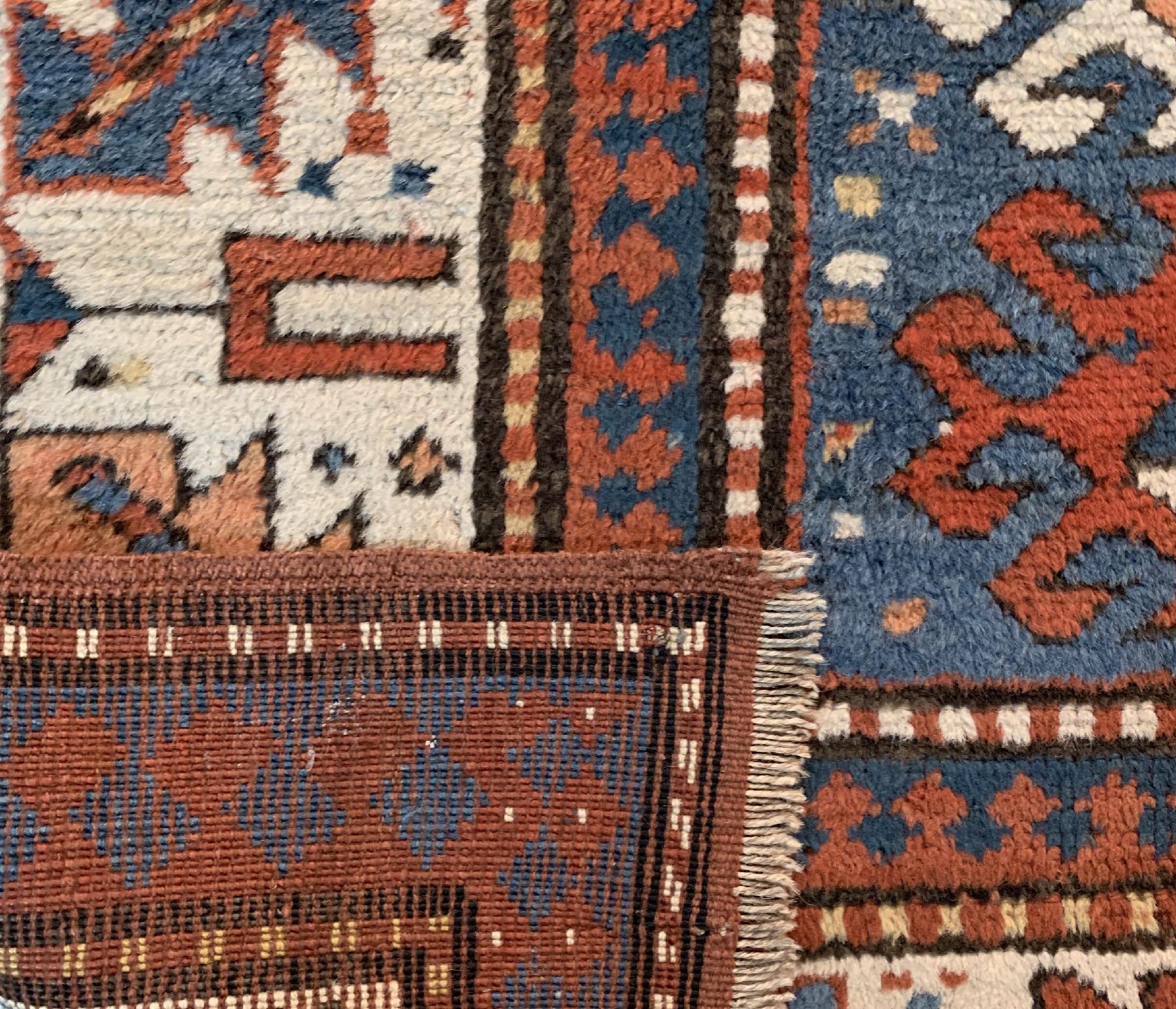 Detail d: Borchalu Kazak antik, Südwestkaukasus, 19 Jhd, Wolle geknüpft auf Wolle ca, 206 x 110 cm, EHZ:3(guter Zustand,kleine Trittfalte).