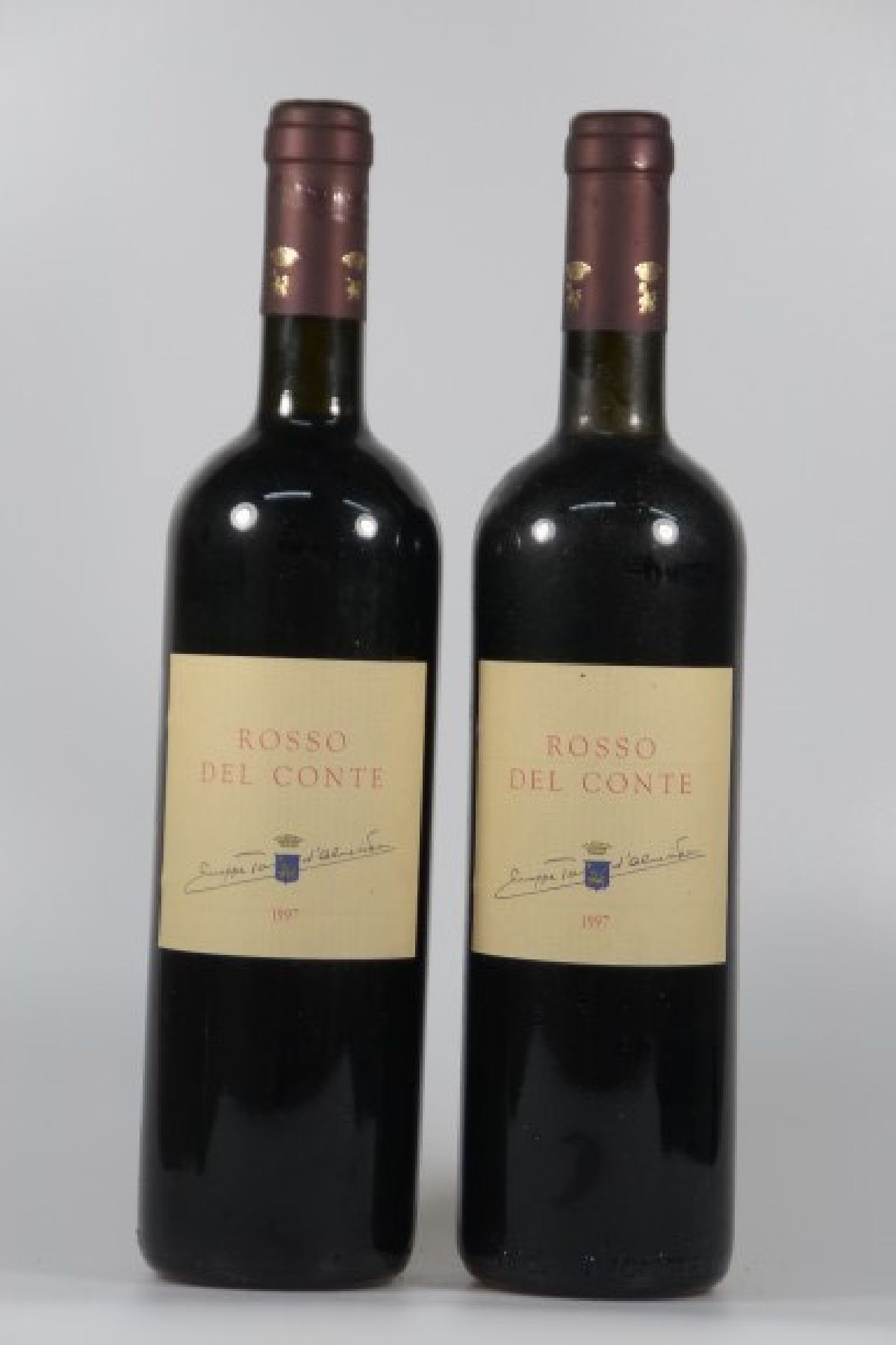 9 Fl. 1997 Rosso Del Conte, Tasca d'Almerita, Italien, 0.75 l, top shoulder, nicht verkostet, l. Alters- u. Gebr.-sp., aus ein ...