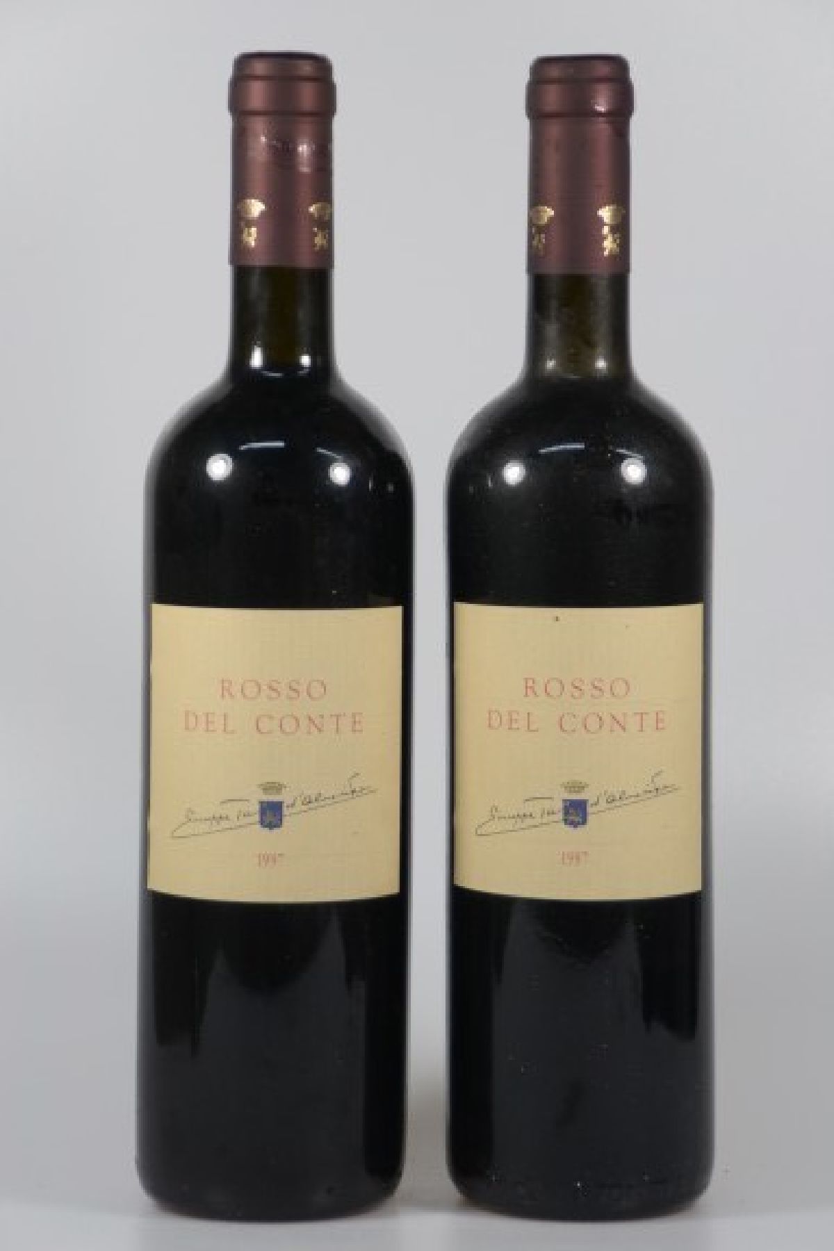 Detail a: 9 Fl. 1997 Rosso Del Conte, Tasca d'Almerita, Italien, 0.75 l, top shoulder, nicht verkostet, l. Alters- u. Gebr.-sp., aus ein ...