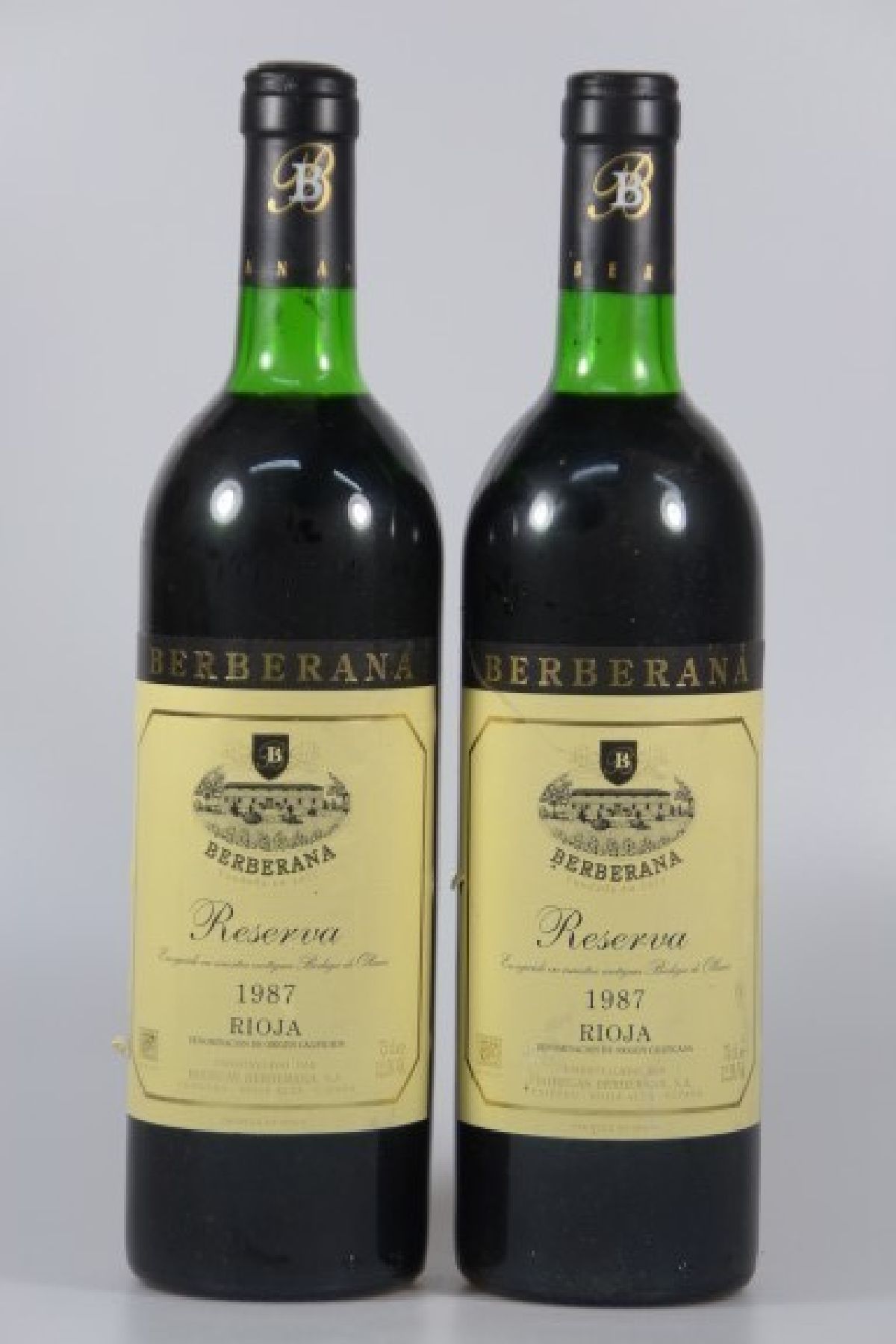 10 Fl. 1987 Berberana, Reserva, Rioja Alta, Spanien, 0.75 l, Etiketten und Flaschen mit l. Alters- und Gebr.-spuren, mid shoulder - top shoulder, ...
