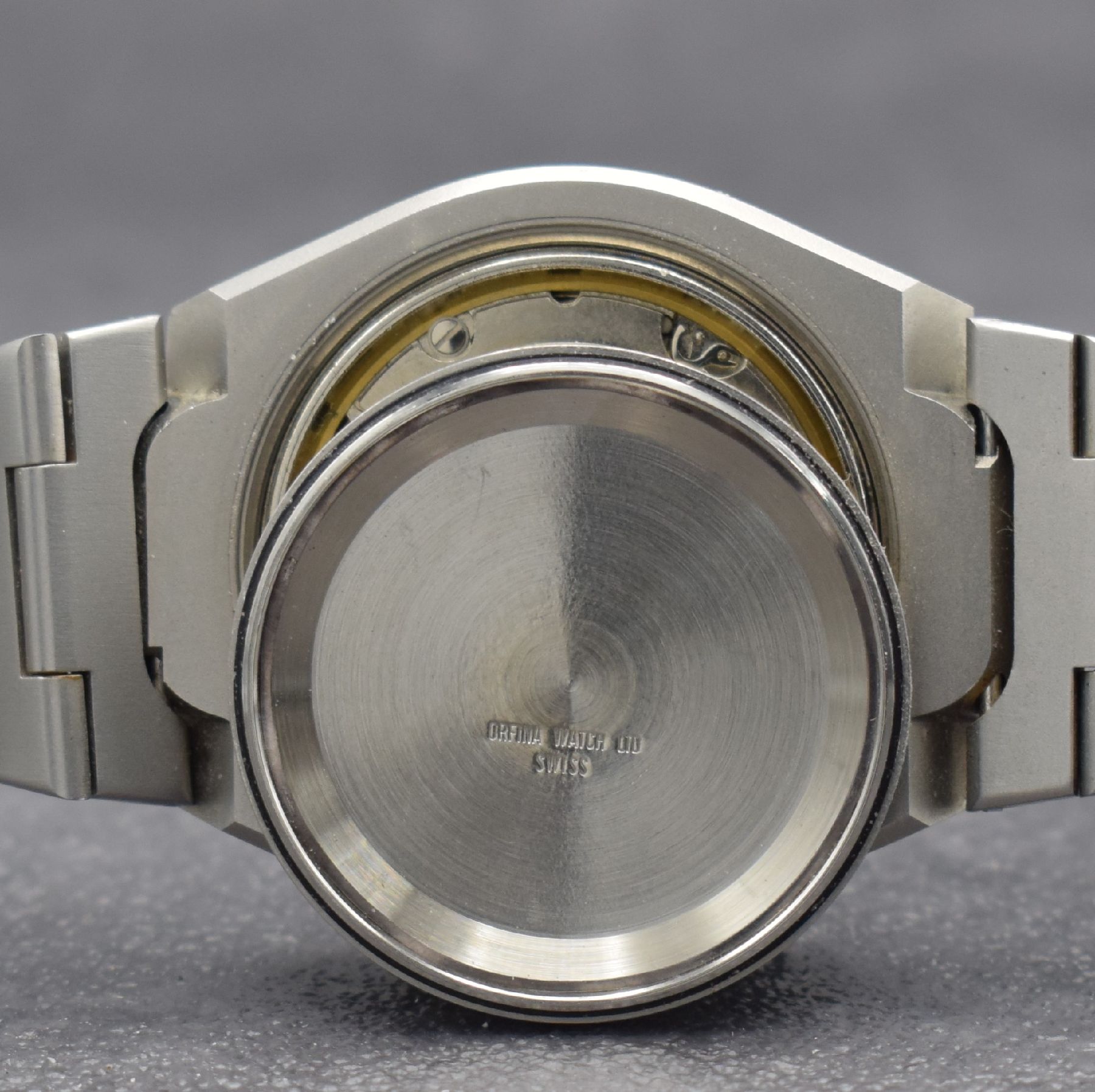 Detail i: ORFINA / PORSCHE DESIGN Armbanduhr, Schweiz 1990er Jahre, Automatik, matt. Edelstahlgeh. inkl. Gliederband, Boden verschr., schwarzes Zifferbl. m. ...